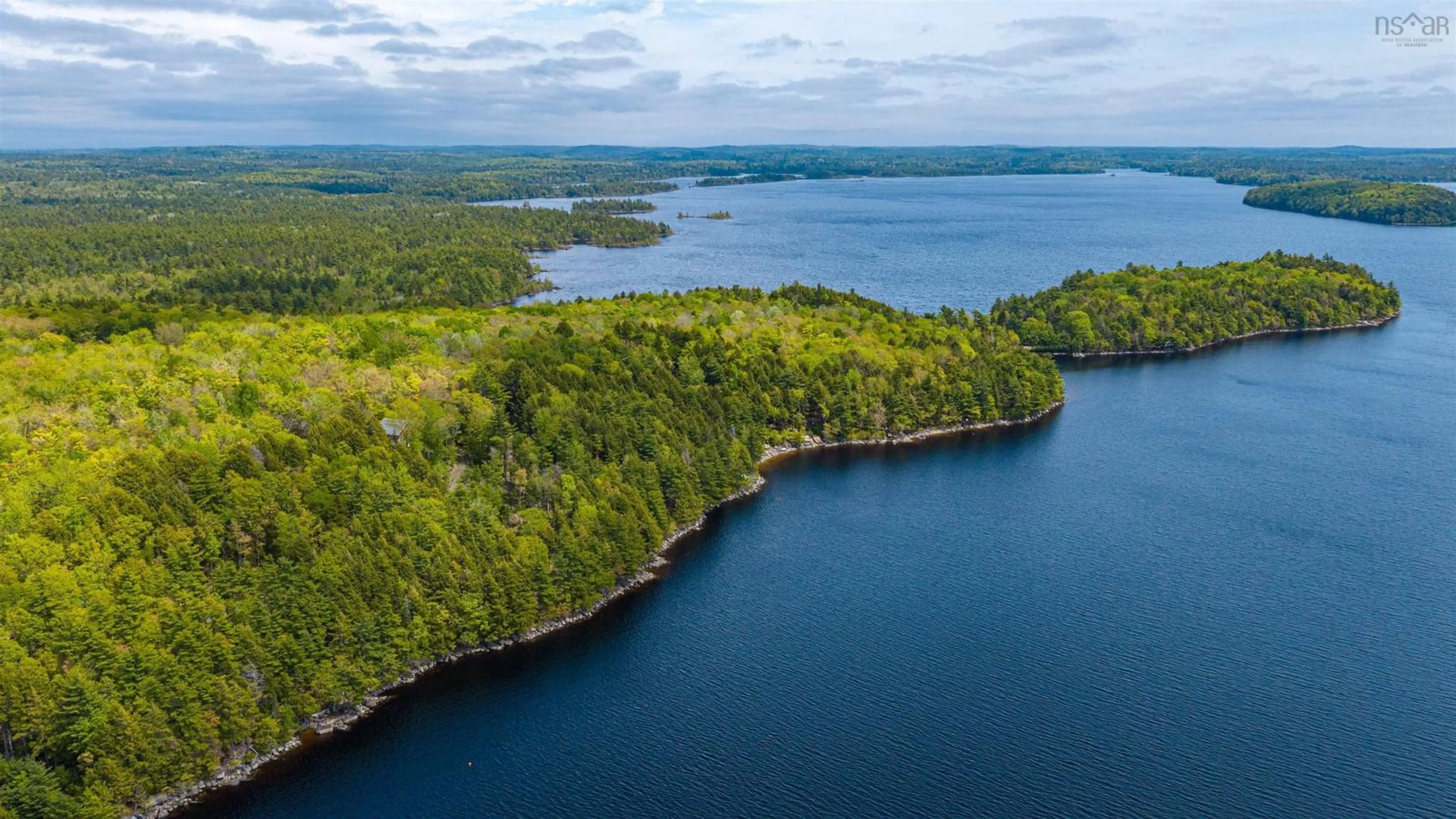 A pic from outside/outdoor area/front of a property/back of a property/a pic from drone, water/lake/river/ocean view for 265 High Point Terr, Molega Nova Scotia B0T 1X0