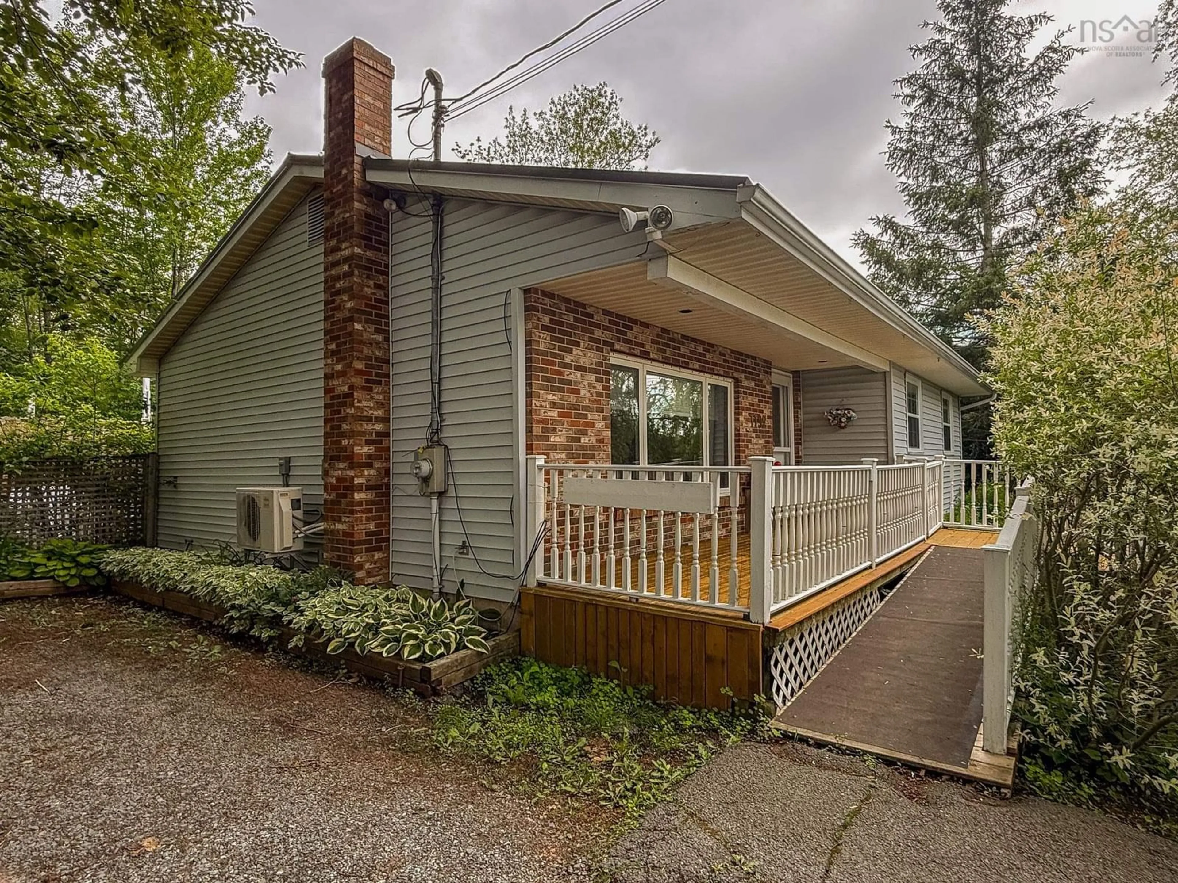 Home with vinyl exterior material, street for 1192 Highway 2, Lantz Nova Scotia B2S 1T5