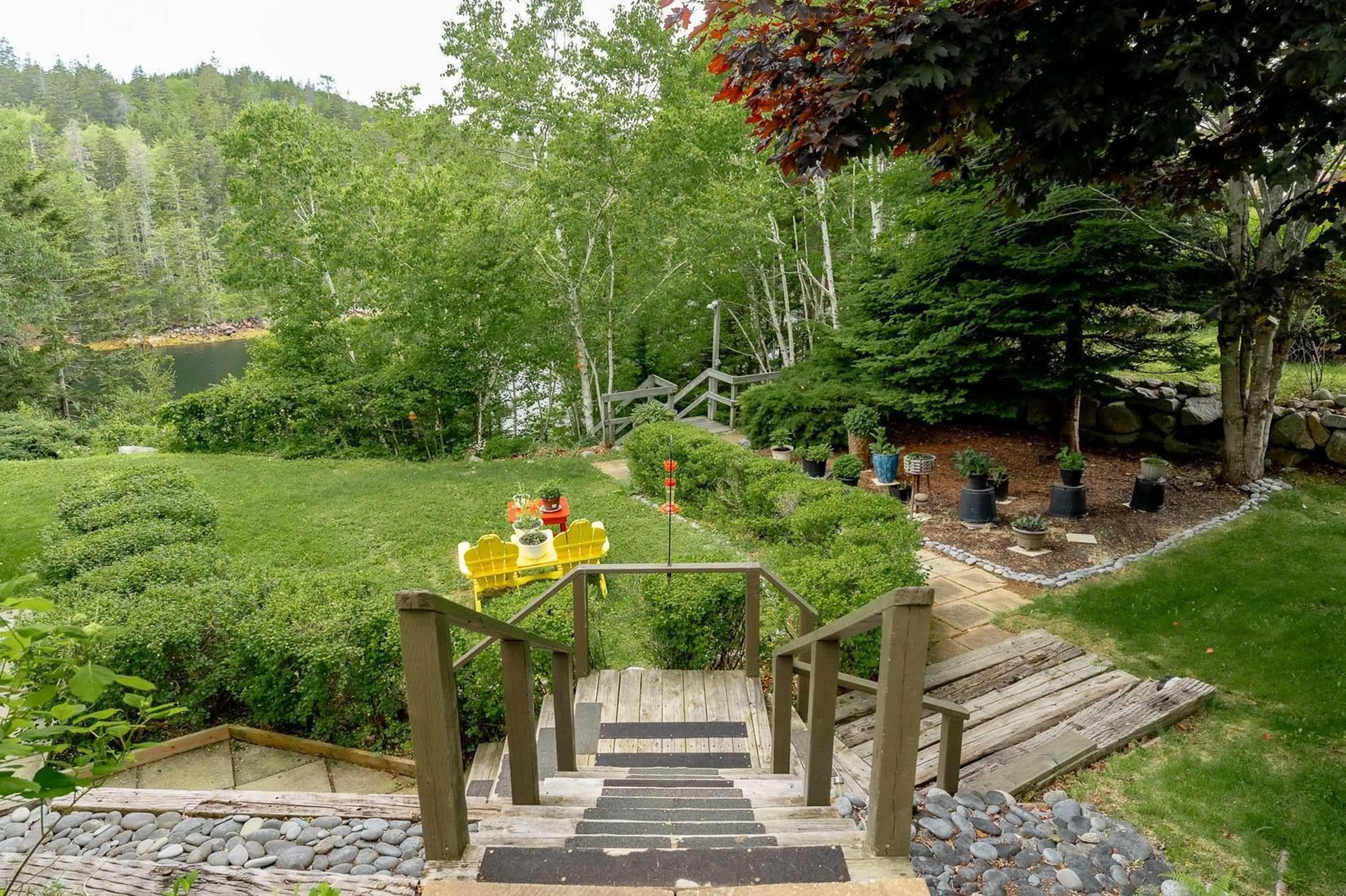Patio, forest/trees view for 25 Ocean Marina Dr #203/204, Deep Cove Nova Scotia B0J 1T0