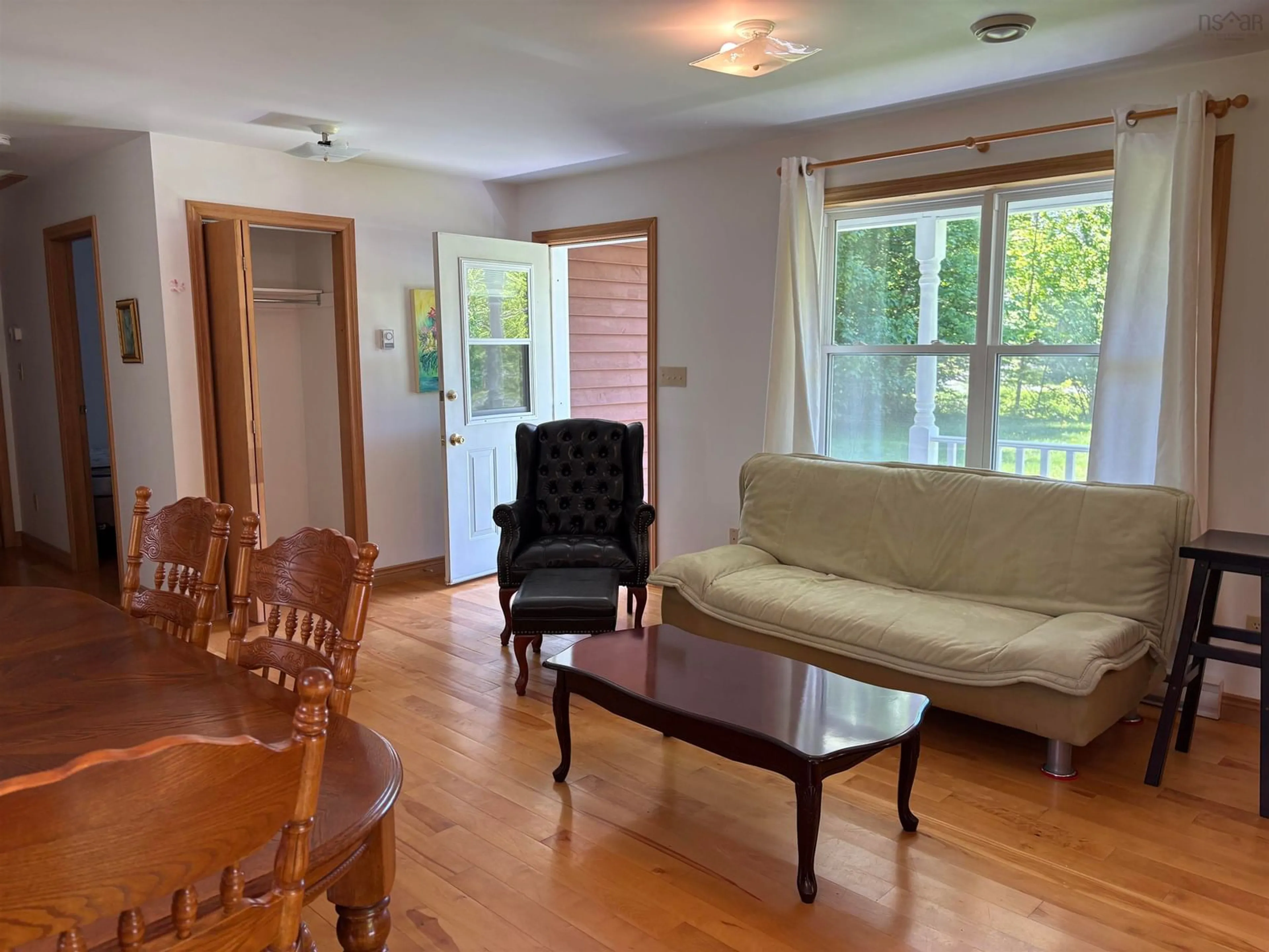 Living room with furniture, wood/laminate floor for 327 Tometary Dr, Howie Centre Nova Scotia B1L 1G4