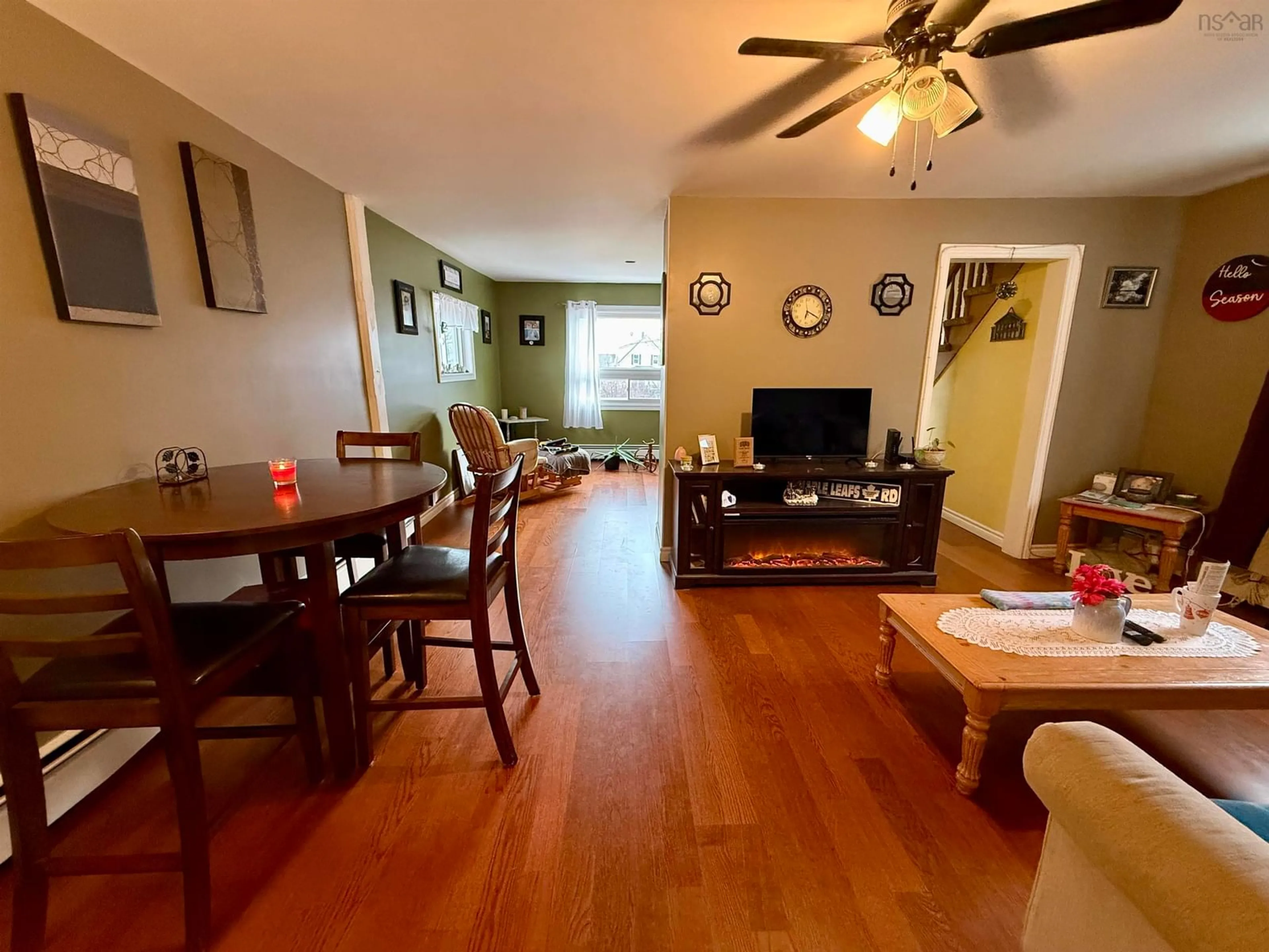 Living room with furniture, wood/laminate floor for 6 Chestnut St, Trenton Nova Scotia B0K 1X0