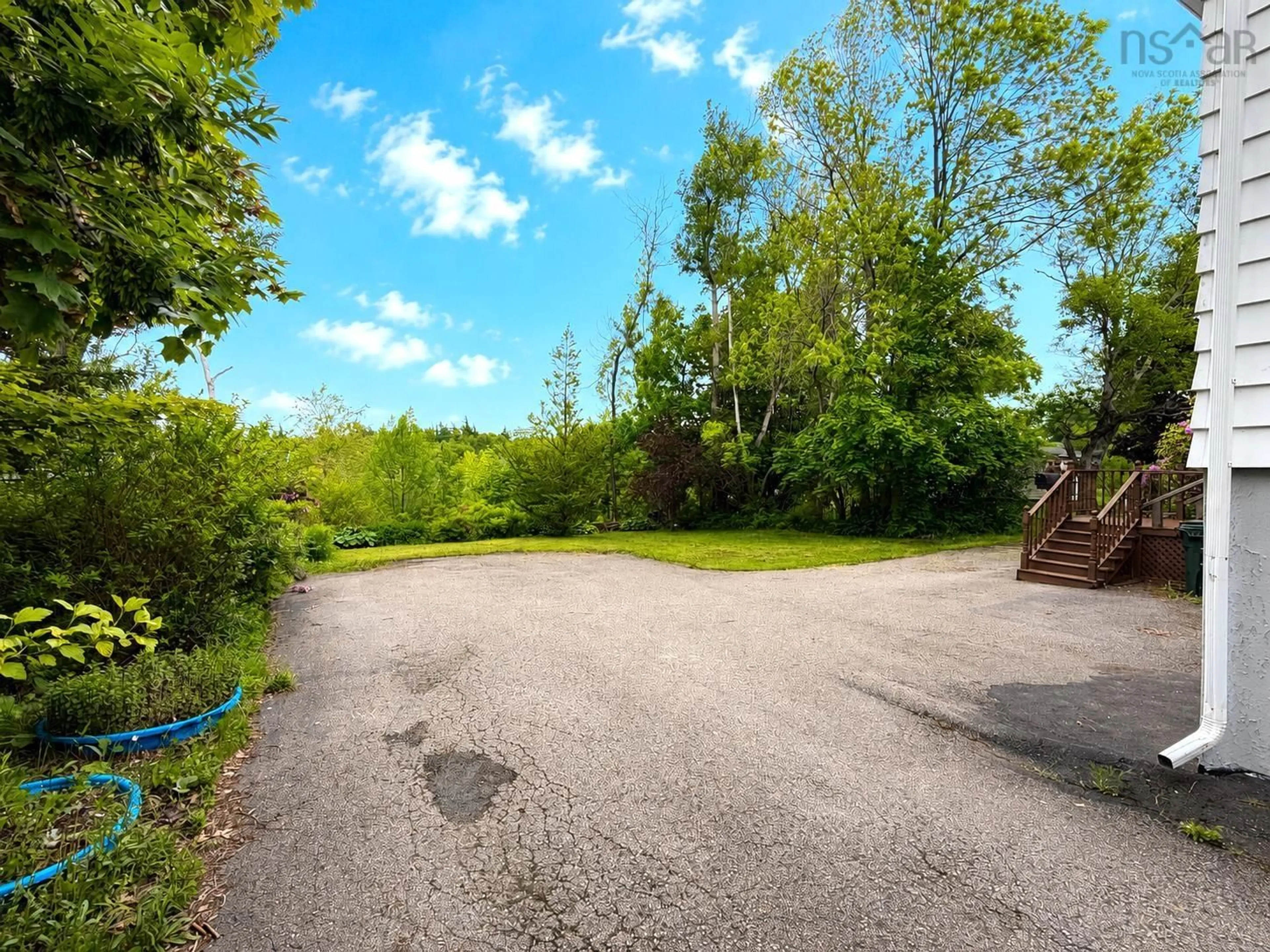 A pic from outside/outdoor area/front of a property/back of a property/a pic from drone, forest/trees view for 207 Mitchell Ave, Dominion Nova Scotia B1G 1N5