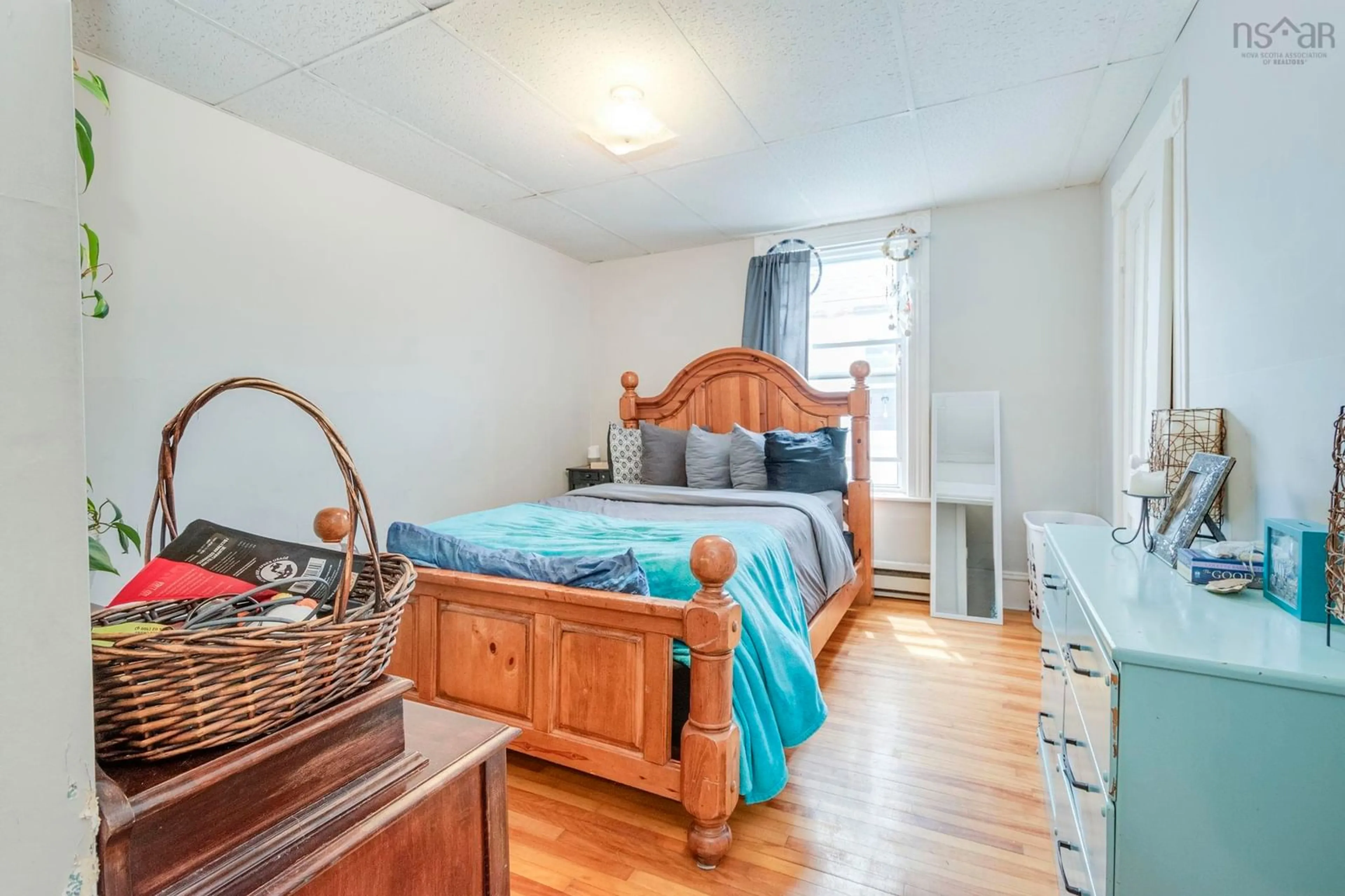 Bedroom with bed, wood/laminate floor for 128 River St, Stellarton Nova Scotia B0K 1S0