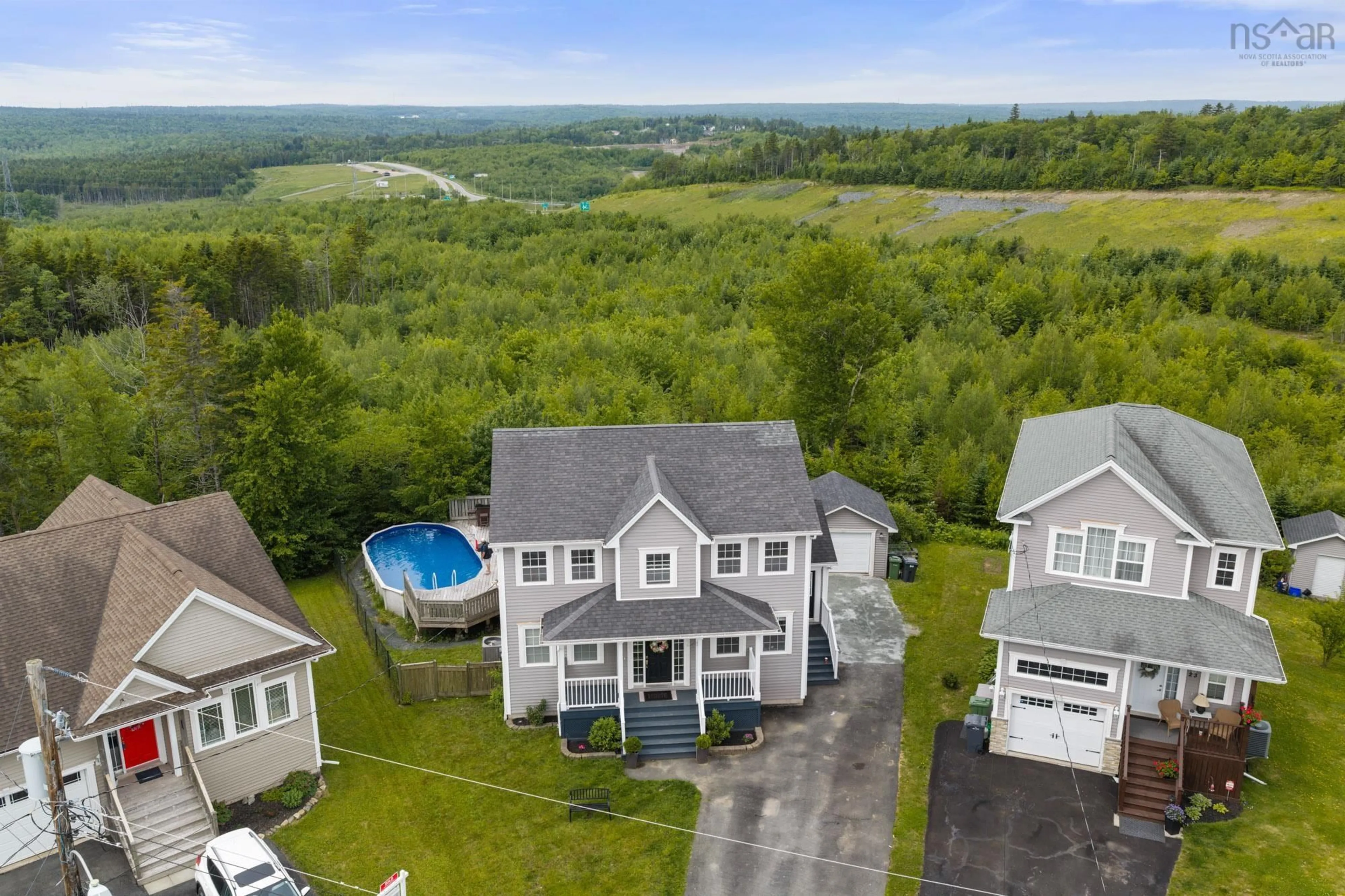 A pic from outside/outdoor area/front of a property/back of a property/a pic from drone, water/lake/river/ocean view for 27 Barnsley Crt, Middle Sackville Nova Scotia B4E 0H3