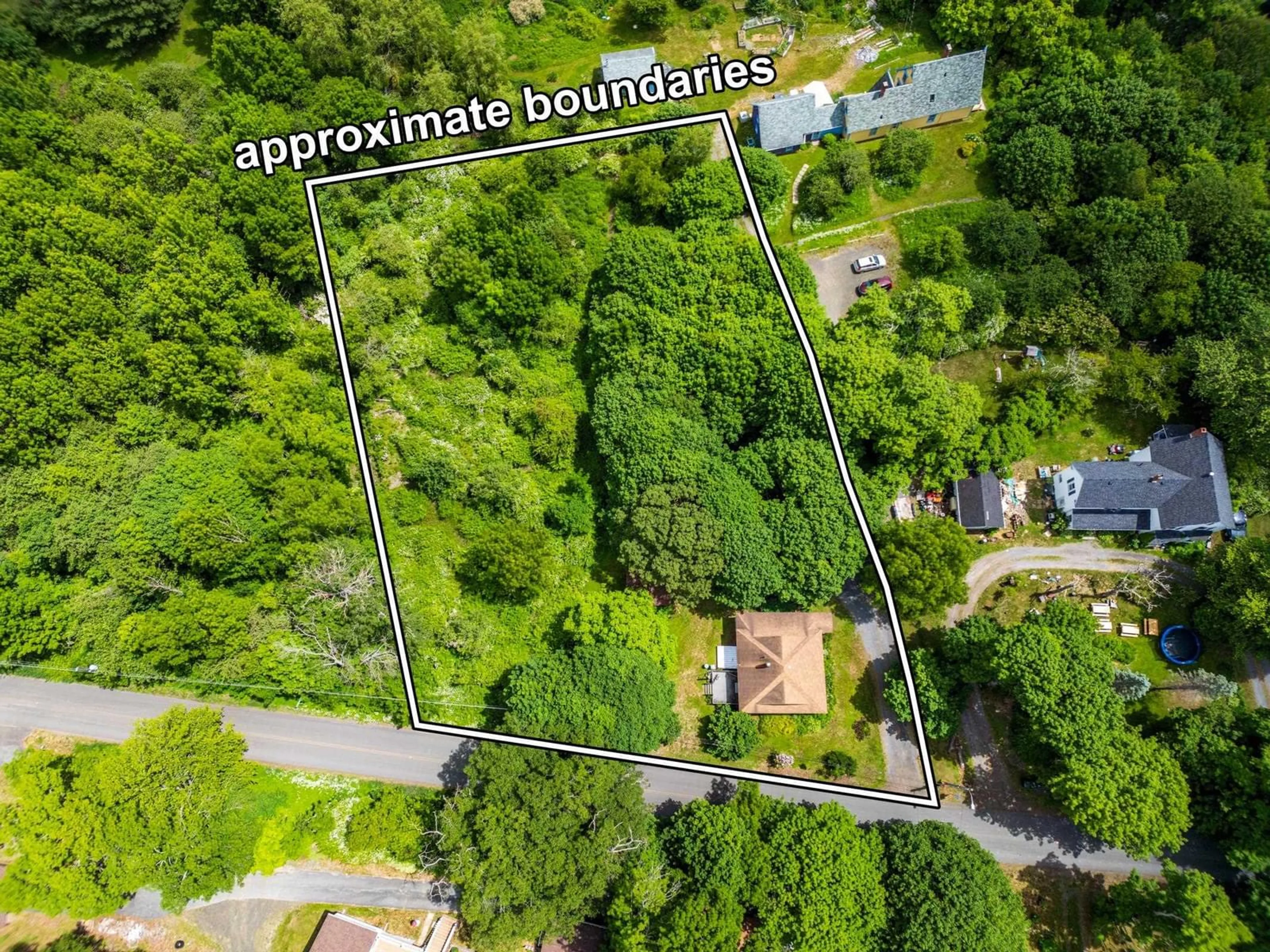 A pic from outside/outdoor area/front of a property/back of a property/a pic from drone, building for 965 Riverview Road, Bear River Nova Scotia B0S 1B0