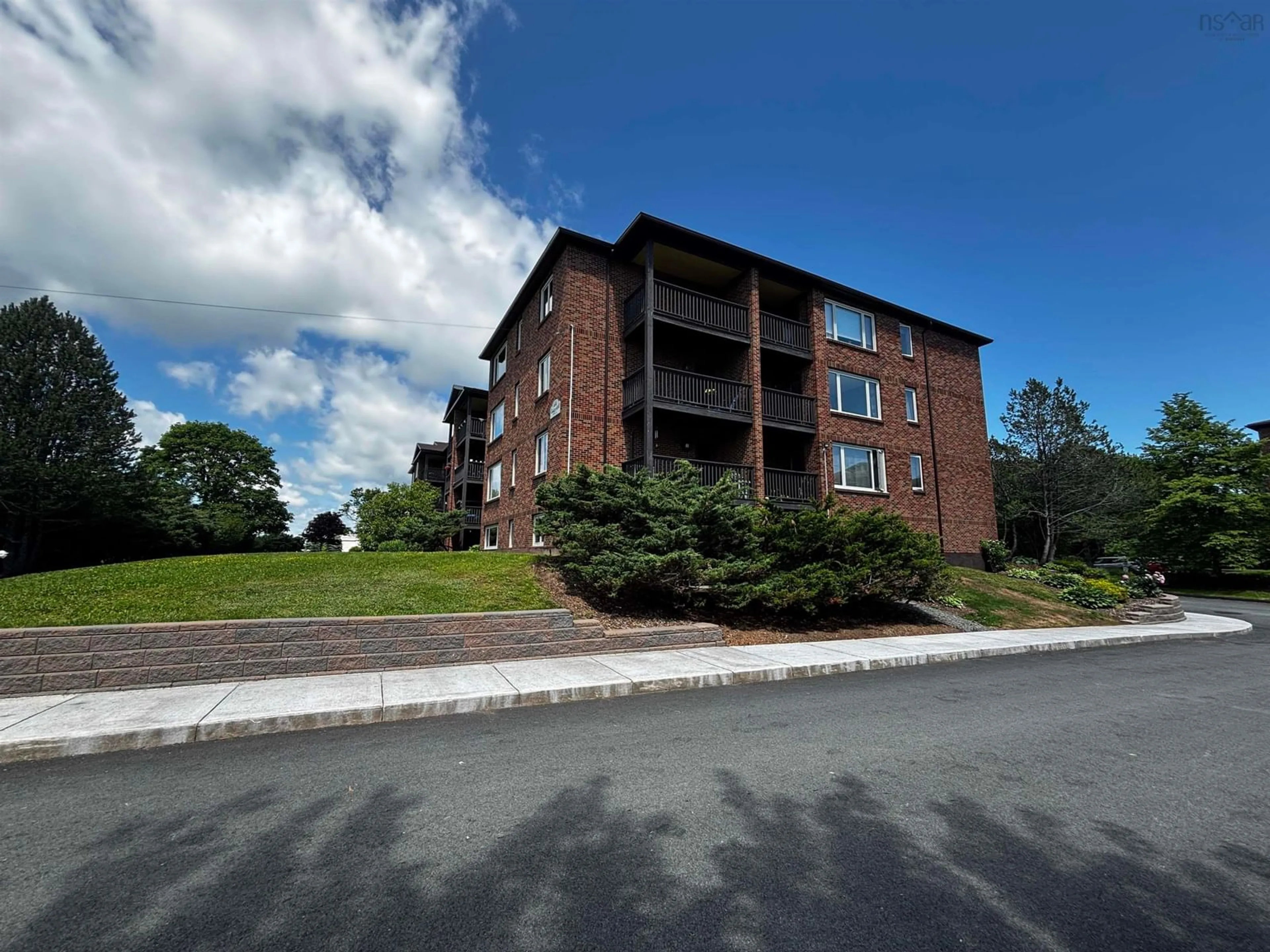 A pic from outside/outdoor area/front of a property/back of a property/a pic from drone, building for 64 Cumberland Dr #410, Cole Harbour Nova Scotia B2V 2C7