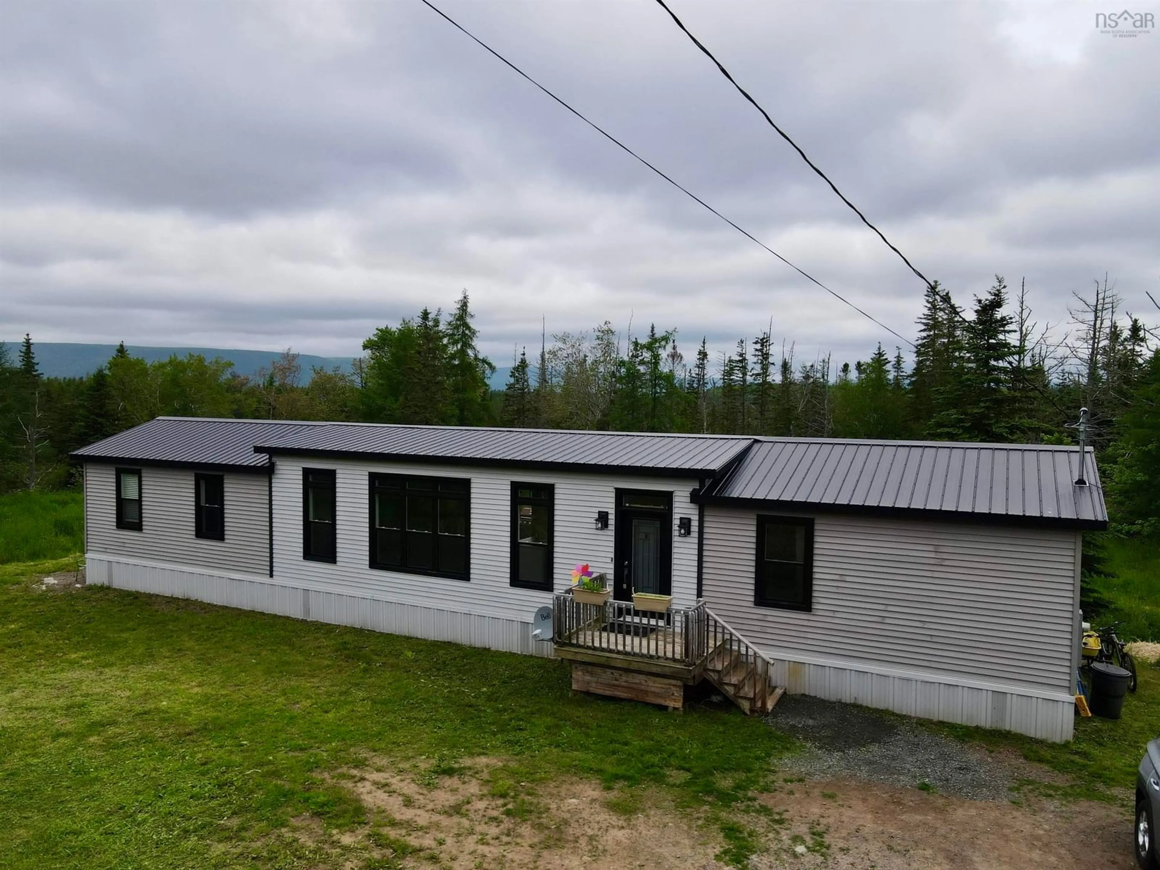 A pic from outside/outdoor area/front of a property/back of a property/a pic from drone, building for 370 Old Margaree Rd, Big Baddeck Nova Scotia B0E 1B0