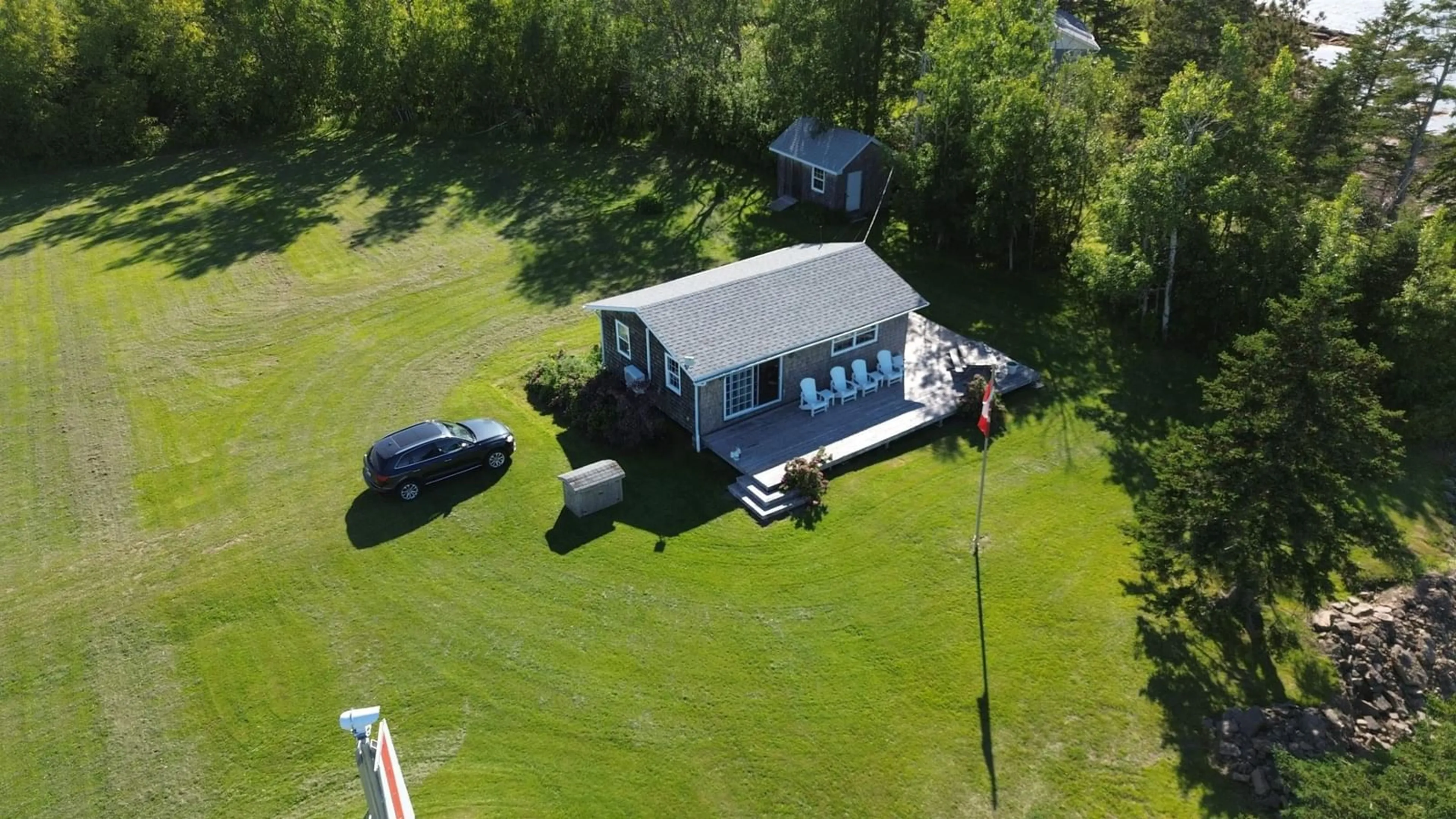 A pic from outside/outdoor area/front of a property/back of a property/a pic from drone, unknown for 59 Harbour Lane, Pugwash Nova Scotia B0K 1L0