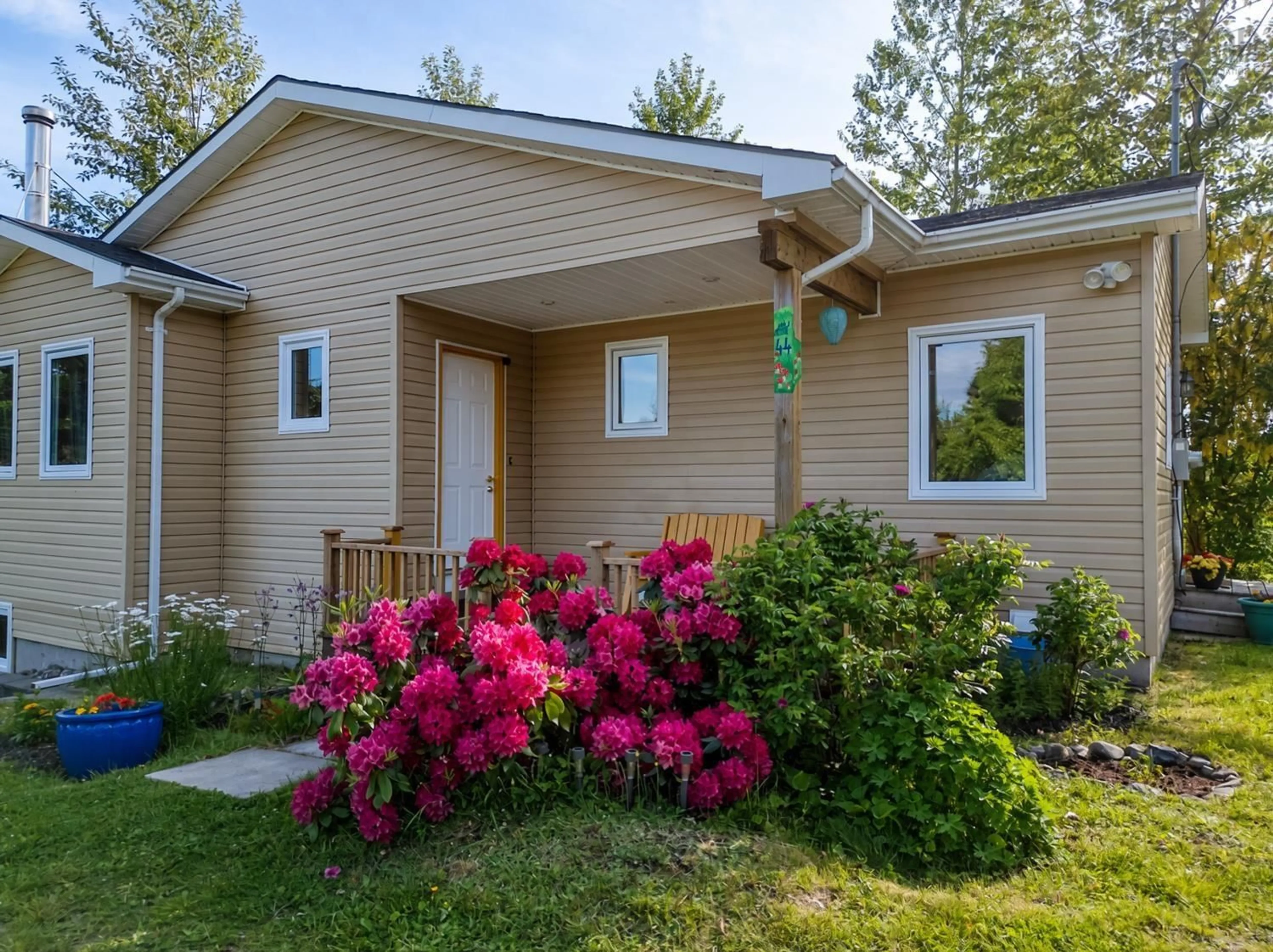 Home with vinyl exterior material, street for 44 Bullfrog Lane, Bear Cove Nova Scotia B3V 1J8
