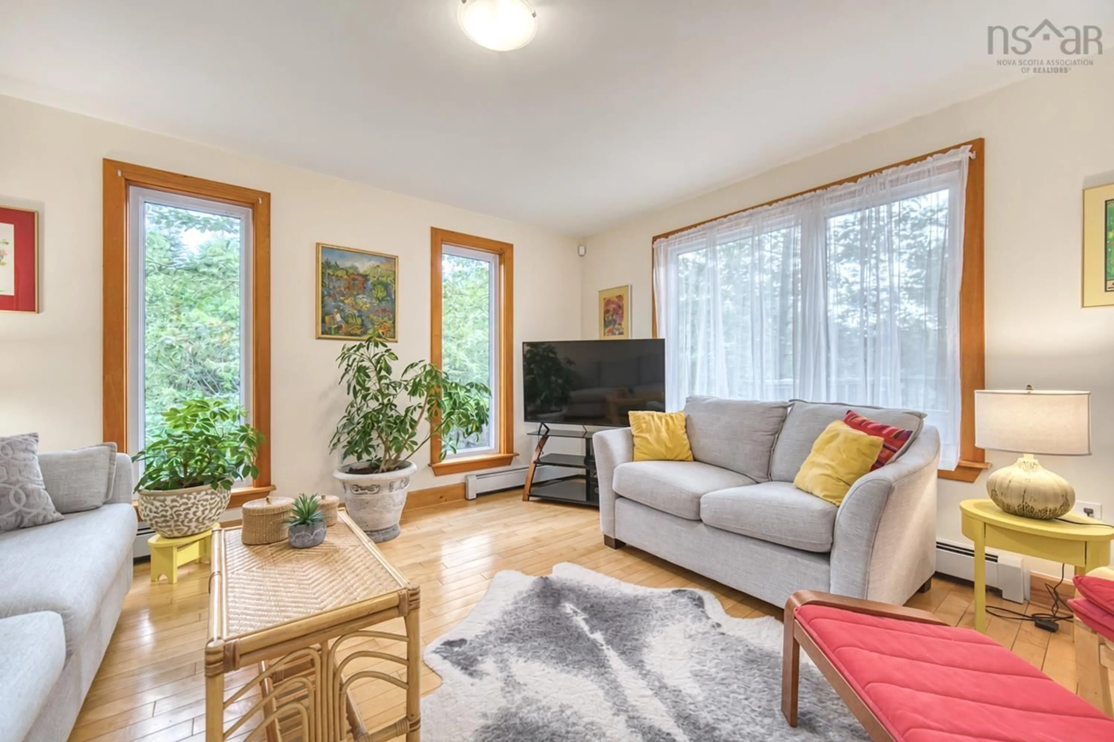 Living room with furniture, wood/laminate floor for 44 Bullfrog Lane, Bear Cove Nova Scotia B3V 1J8