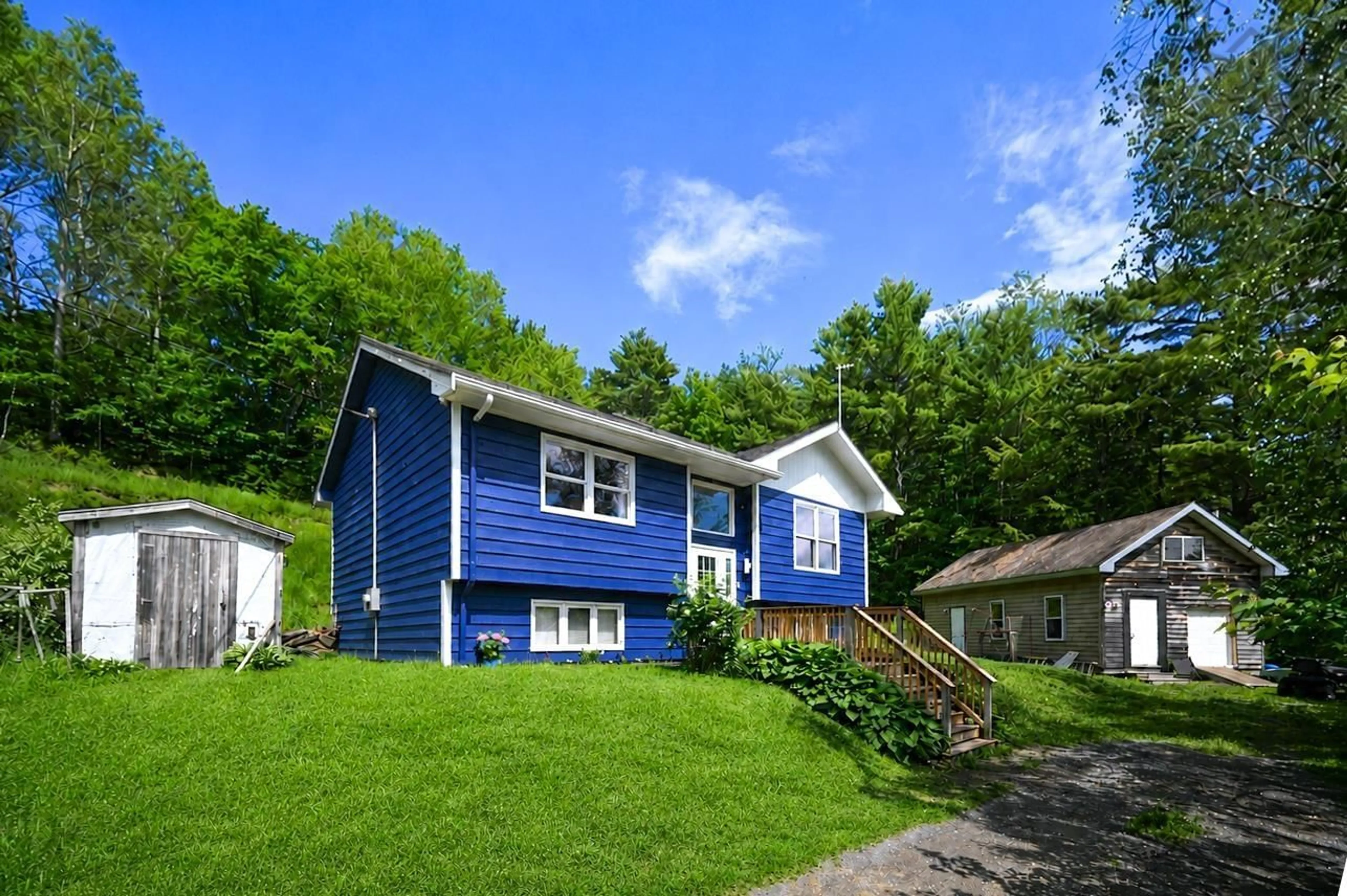 Home with vinyl exterior material, street for 51 Charlie Lane, Pine Grove Nova Scotia B4V 8B7