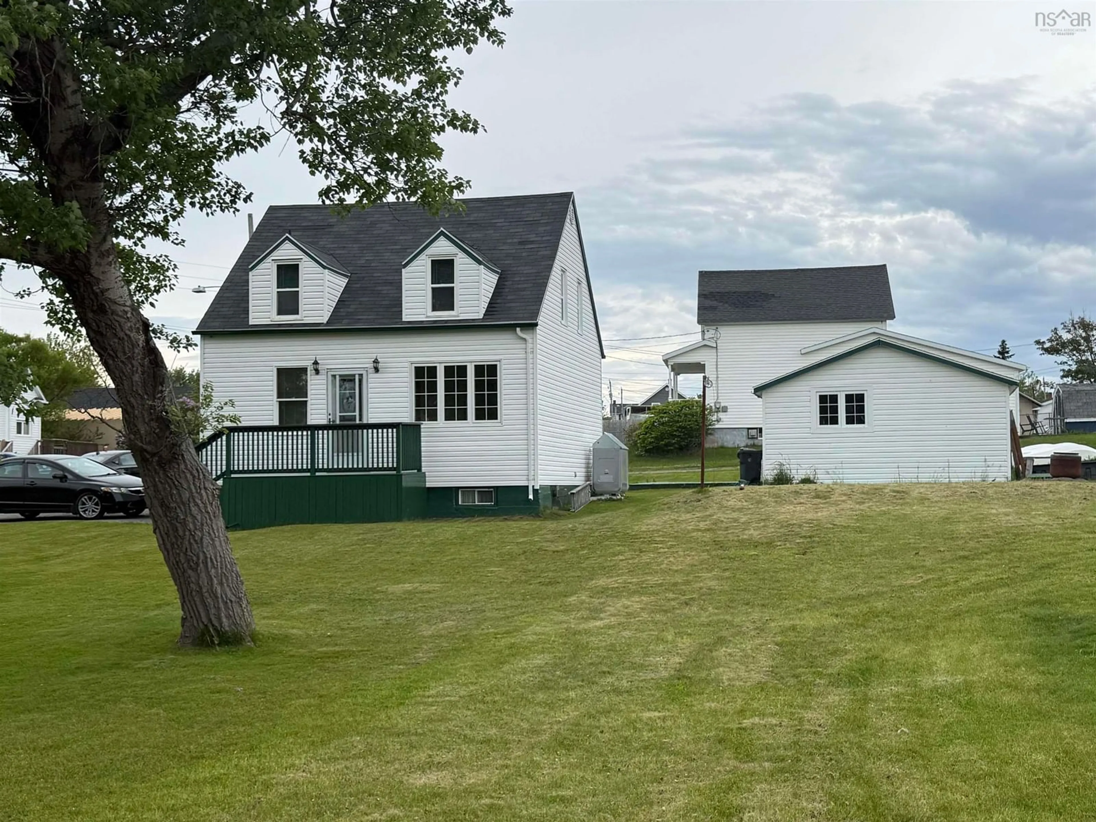 A pic from outside/outdoor area/front of a property/back of a property/a pic from drone, unknown for 3515 Bay Ave, New Waterford Nova Scotia B1H 2P2
