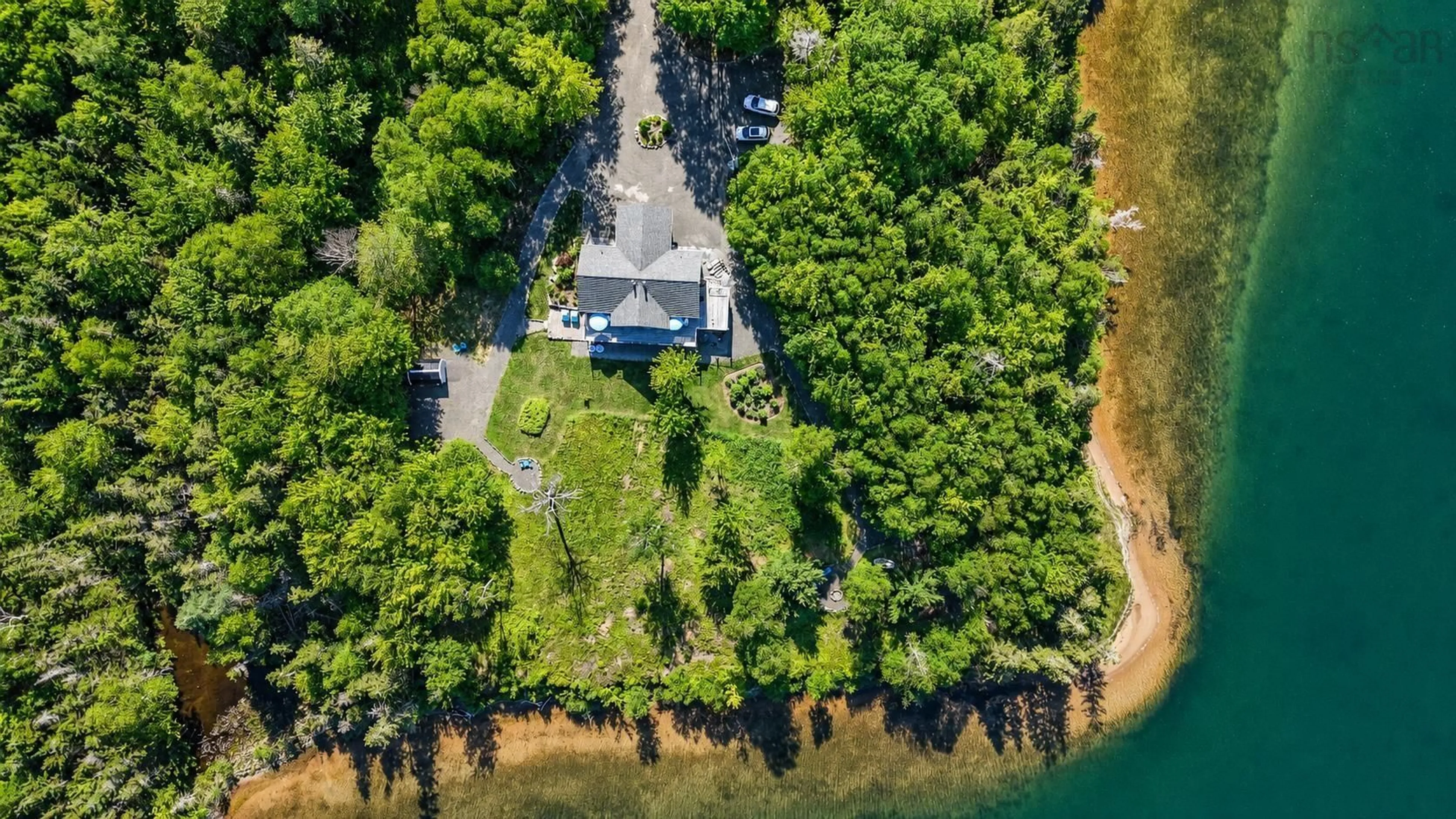 A pic from outside/outdoor area/front of a property/back of a property/a pic from drone, water/lake/river/ocean view for 7548 Marble Mountain Rd, Malagawatch Nova Scotia B0E 2K0
