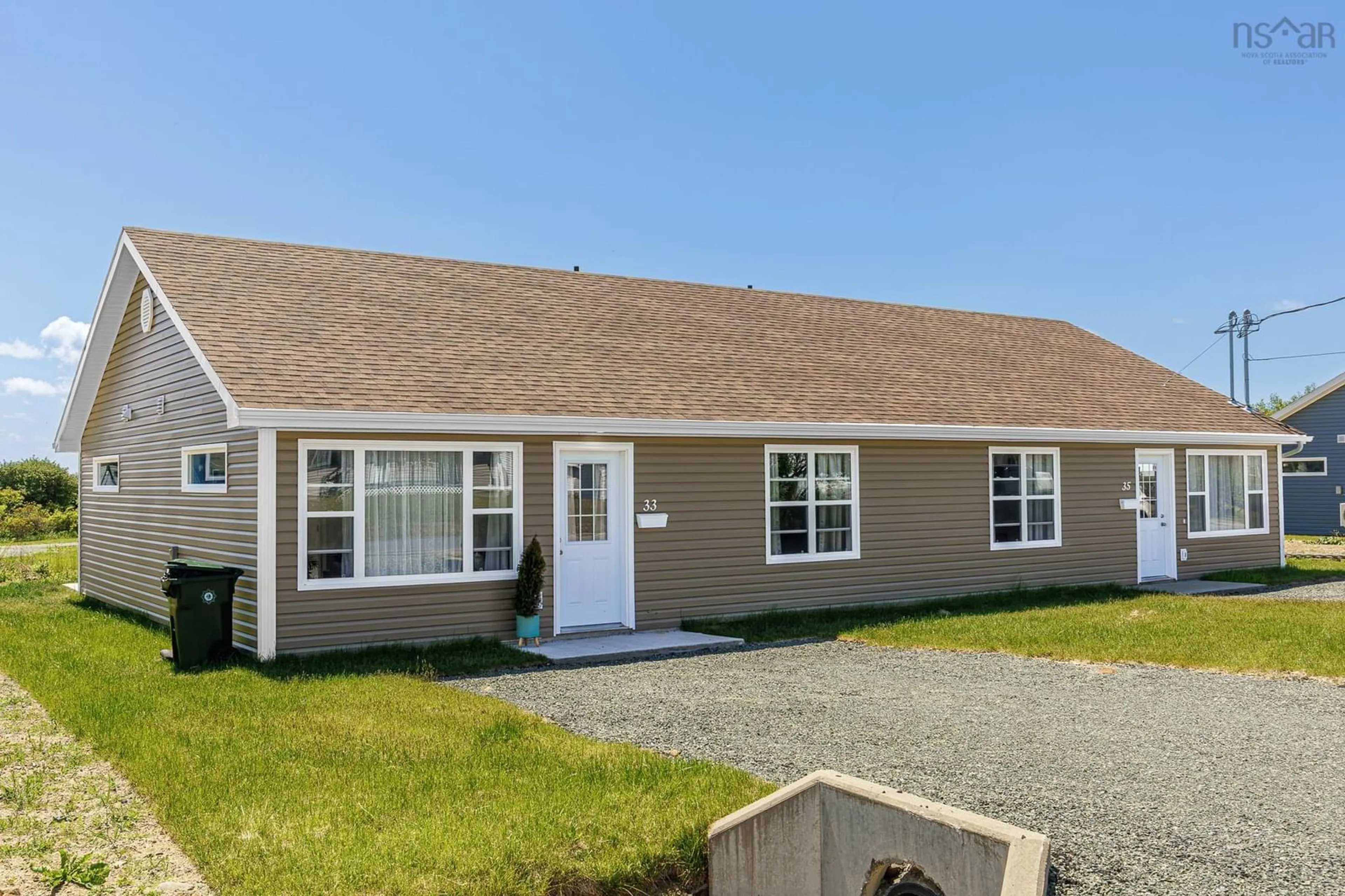 Home with vinyl exterior material, street for 33/35 Maple St, Scotchtown Nova Scotia B1H 3M4