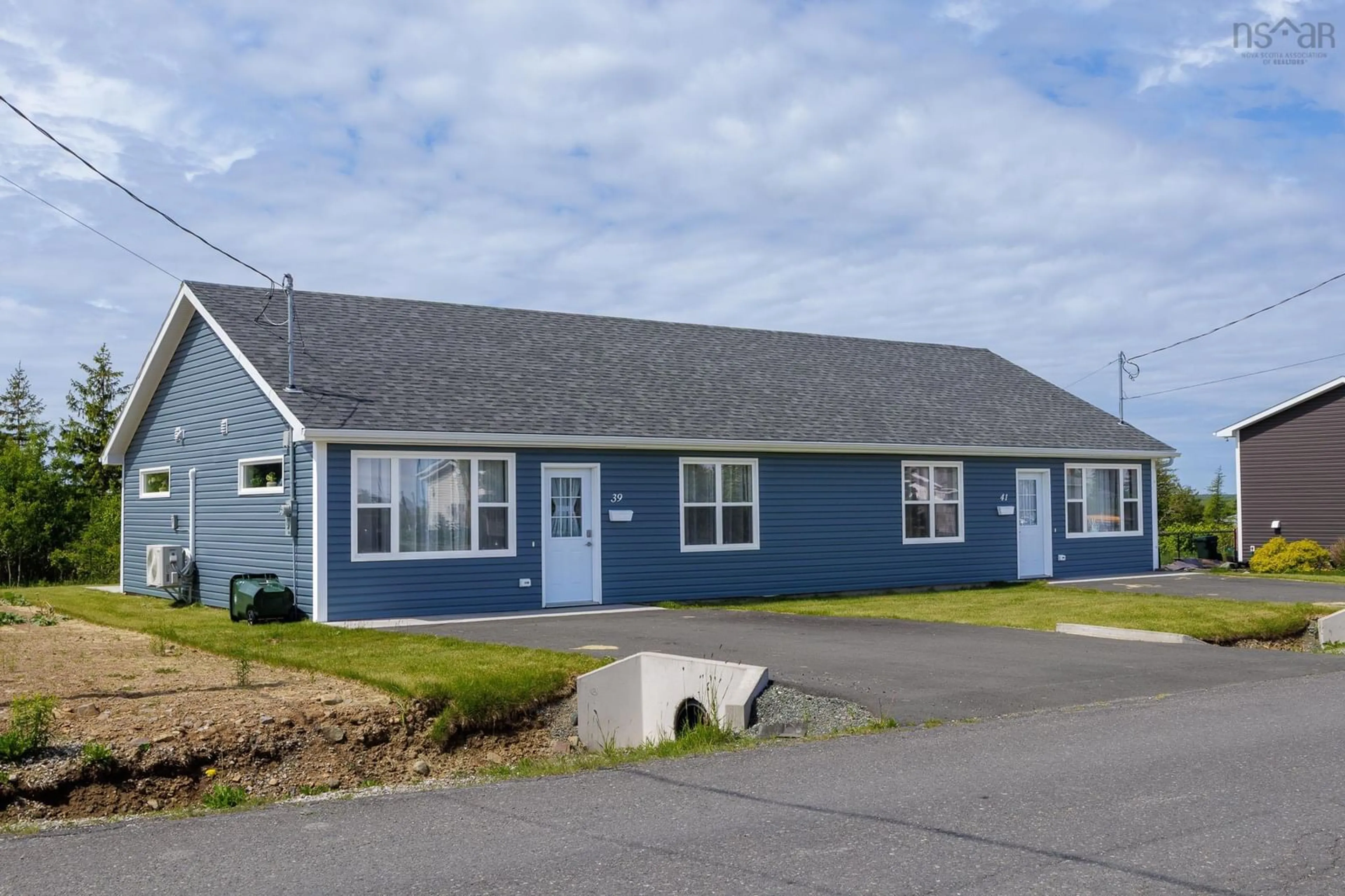 Home with vinyl exterior material, street for 39/41 Maple St, Scotchtown Nova Scotia B1H 3M4