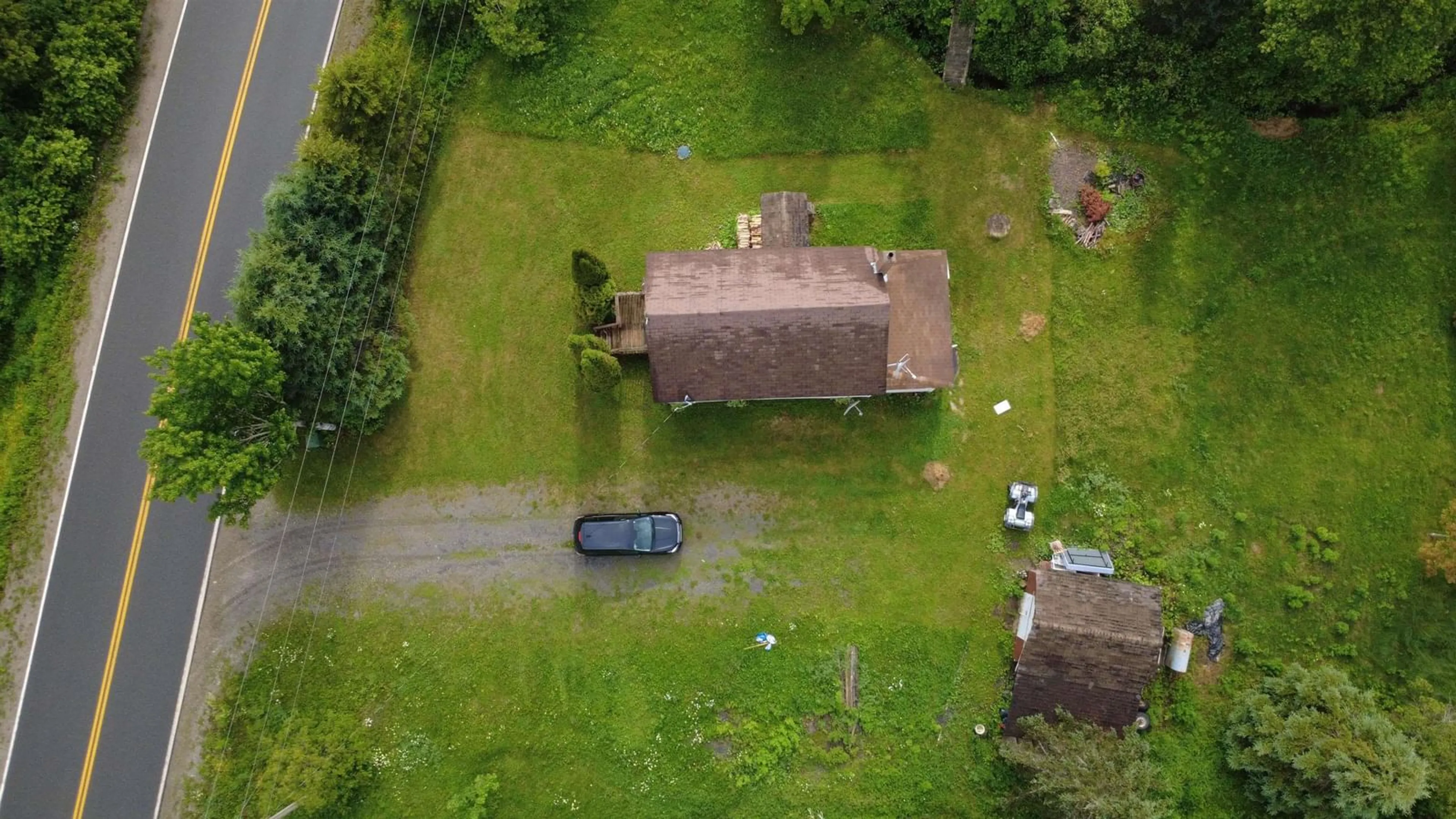 A pic from outside/outdoor area/front of a property/back of a property/a pic from drone, street for 1979 East River West Side Rd, Sunnybrae Nova Scotia B0K 1B0