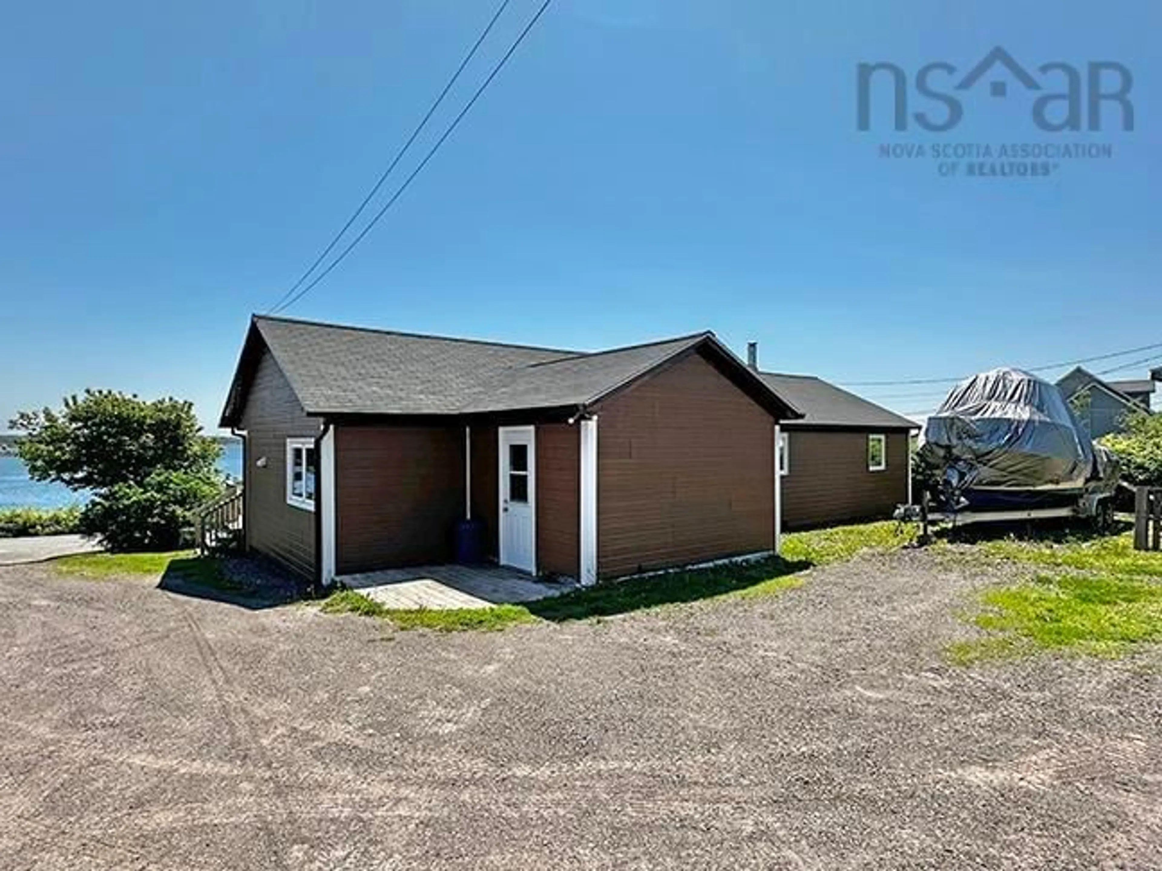 A pic from outside/outdoor area/front of a property/back of a property/a pic from drone, building for 593 Veterans Memorial Dr, Arichat Nova Scotia B0E 1A0