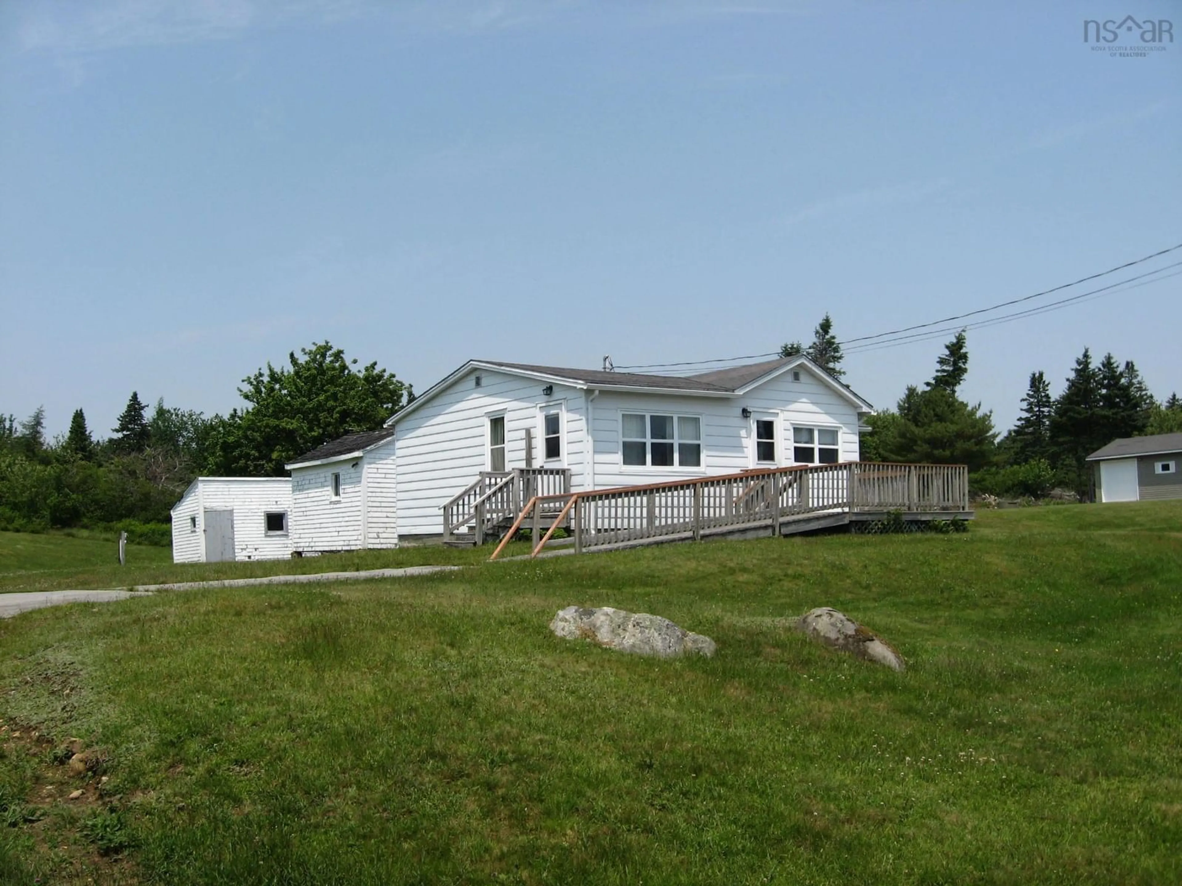 A pic from outside/outdoor area/front of a property/back of a property/a pic from drone, unknown for 6582 Highway 3, Hunts Point Nova Scotia B0T 1G0