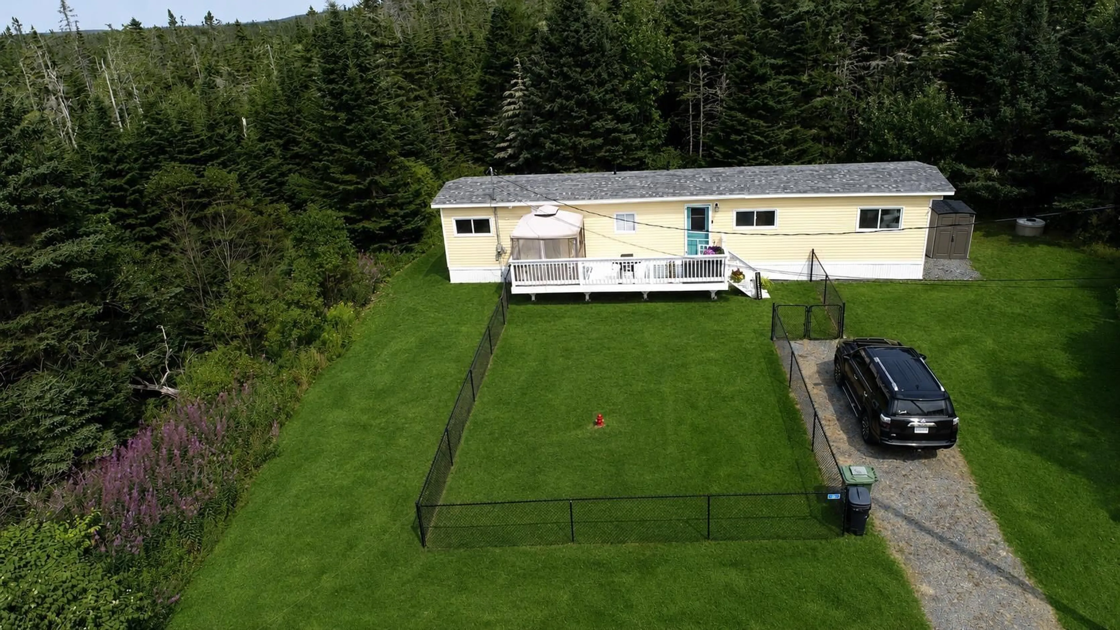 A pic from outside/outdoor area/front of a property/back of a property/a pic from drone, building for 825 East Jeddore Rd, East Jeddore Nova Scotia B0J 2L0