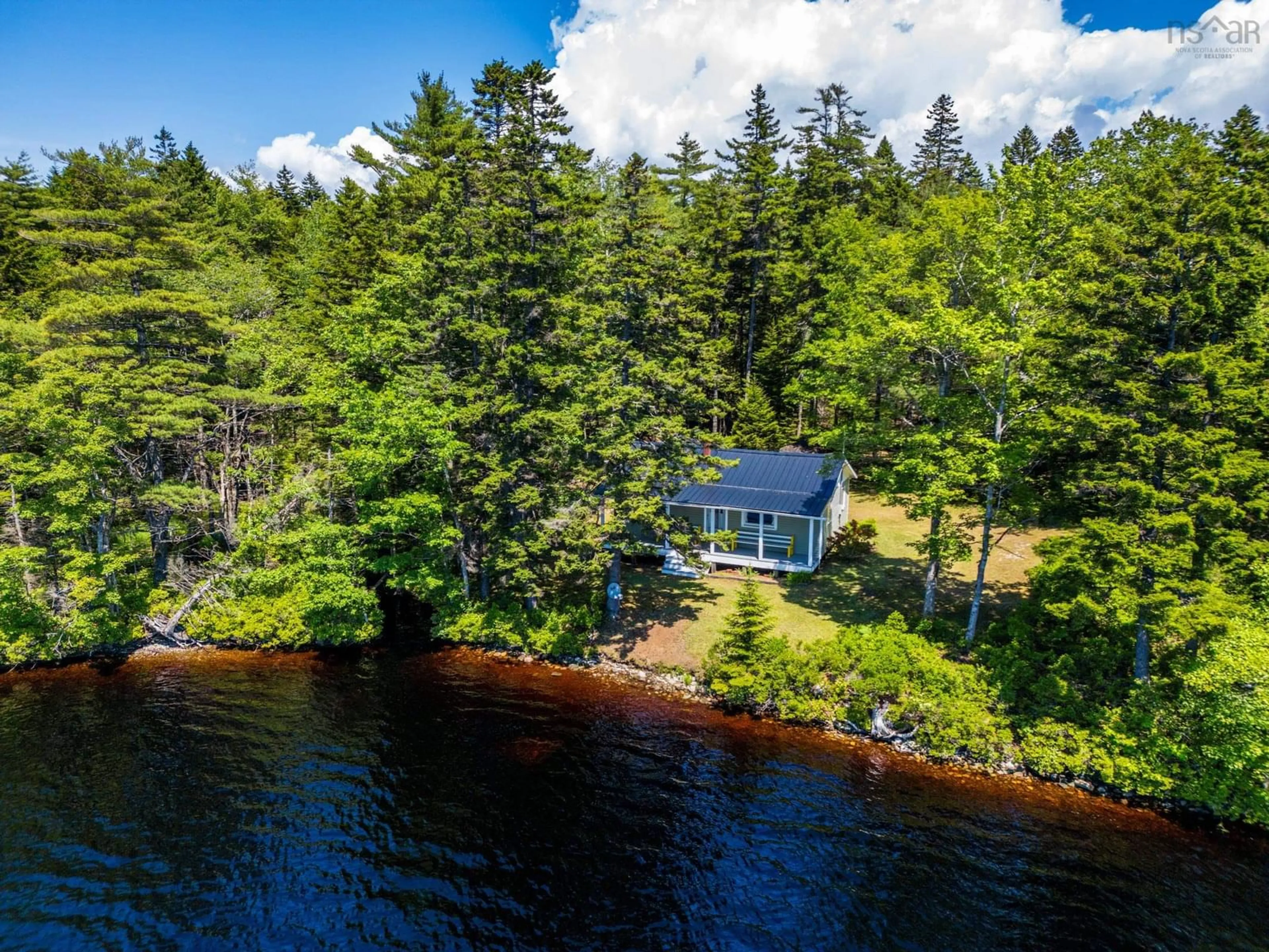 A pic from outside/outdoor area/front of a property/back of a property/a pic from drone, water/lake/river/ocean view for 39 Boarsback Lake Road, Briar Lake Nova Scotia B5A 5R1