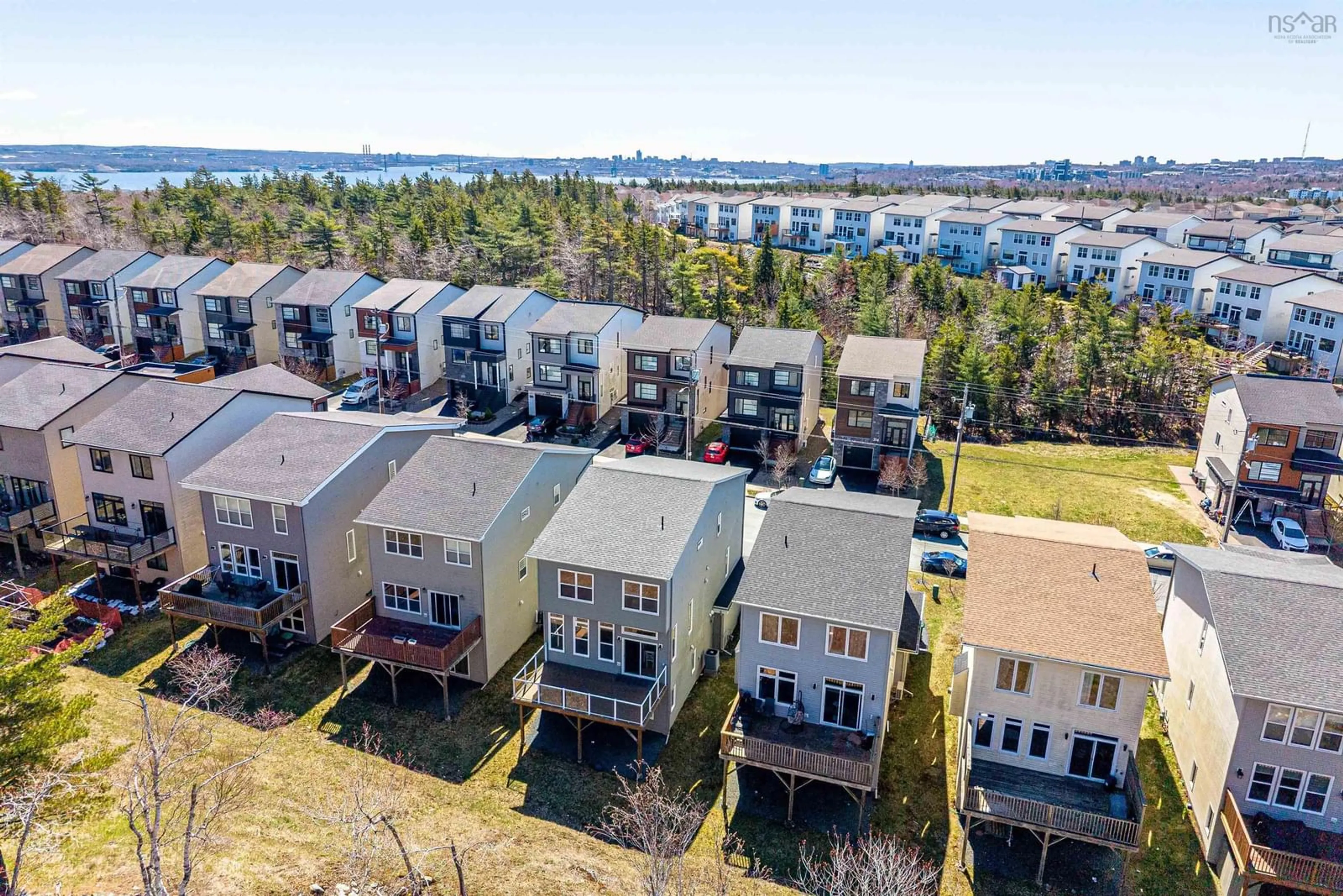 A pic from outside/outdoor area/front of a property/back of a property/a pic from drone, water/lake/river/ocean view for 309 Fleetview Dr, Halifax Nova Scotia B3M 0L9
