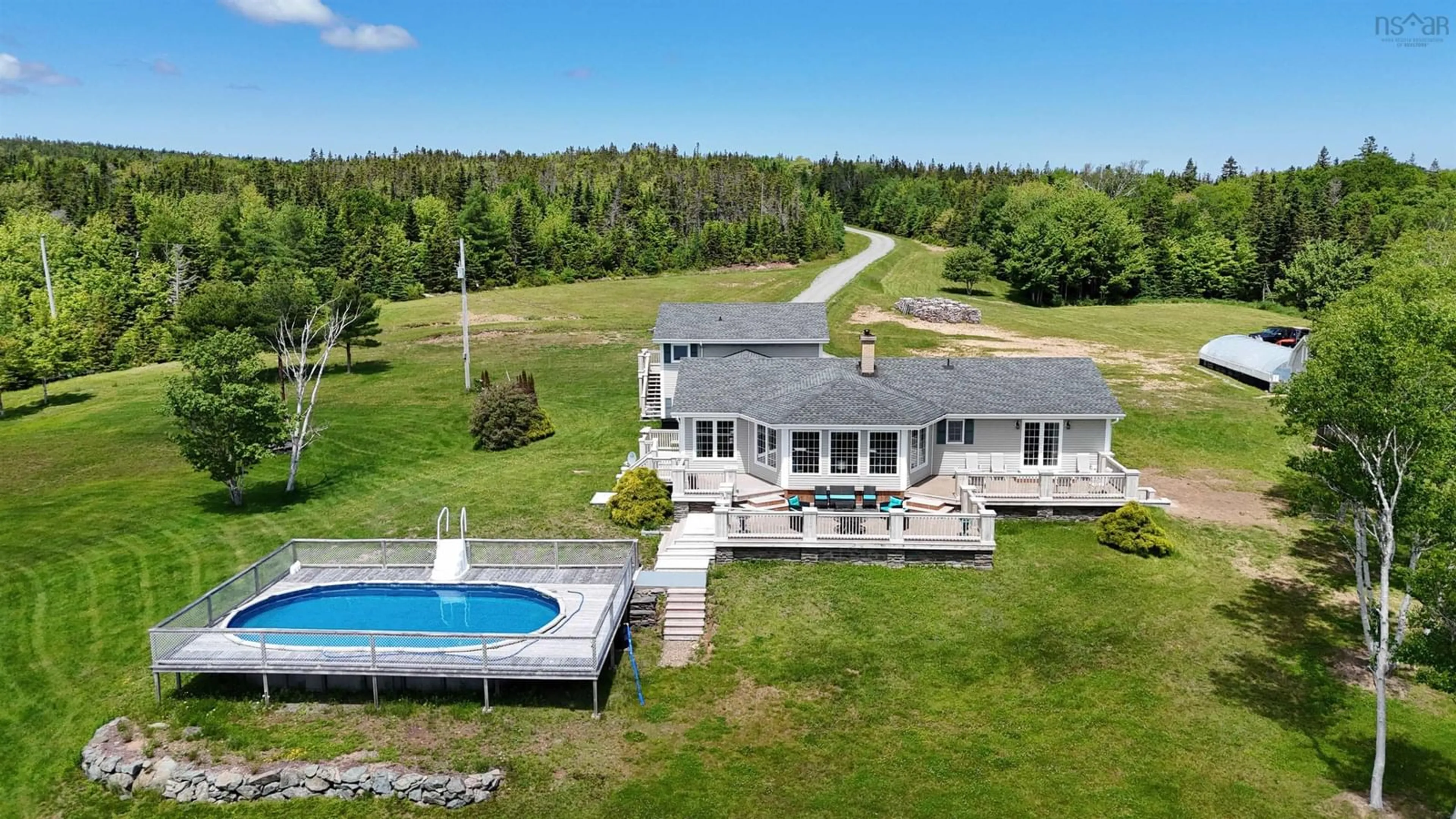 A pic from outside/outdoor area/front of a property/back of a property/a pic from drone, water/lake/river/ocean view for 8265 West Bay Hwy, Sampsonville Nova Scotia B0E 3B0