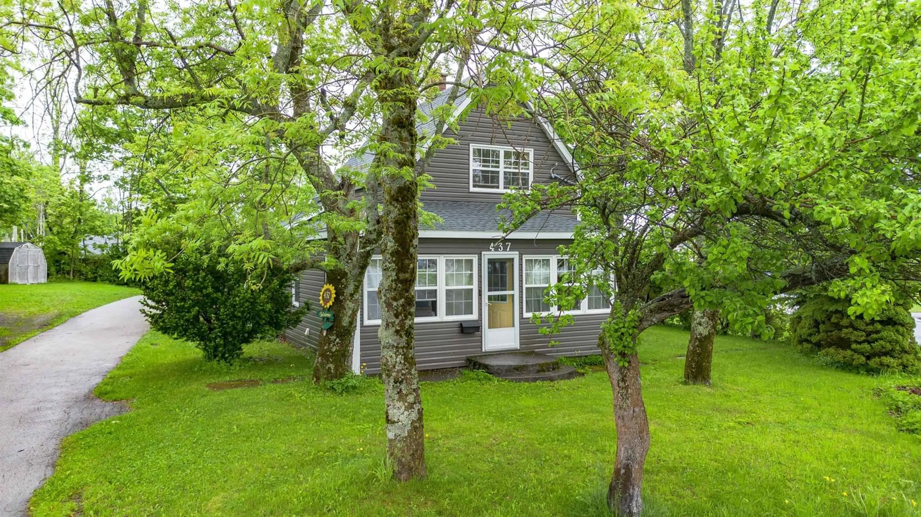 Home with vinyl exterior material, street for 437 Cabot St, Ashby Nova Scotia B1P 4G8