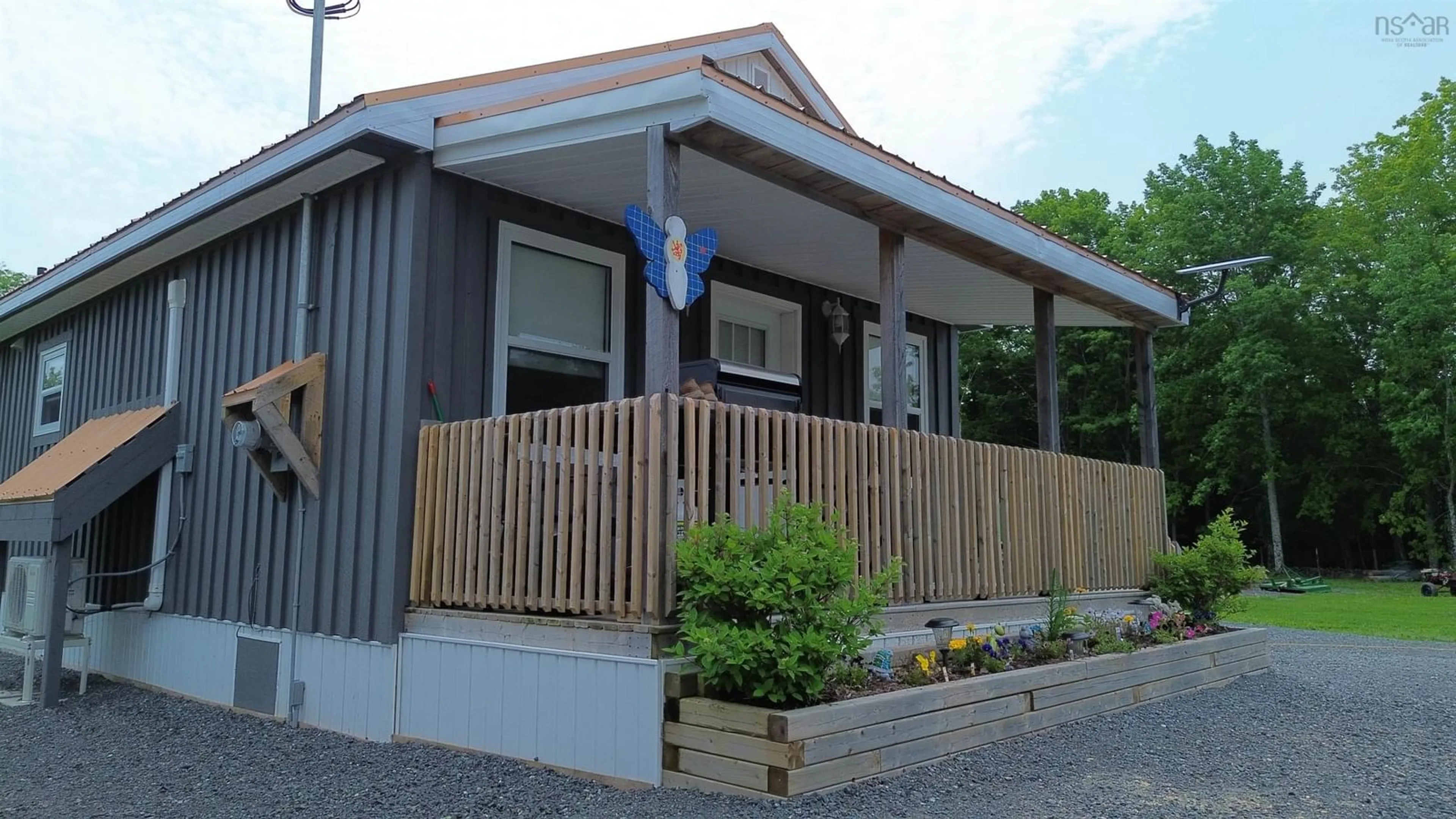 Home with vinyl exterior material, street for 24 Limerock Rd, Millbrook Nova Scotia B0K 1P0