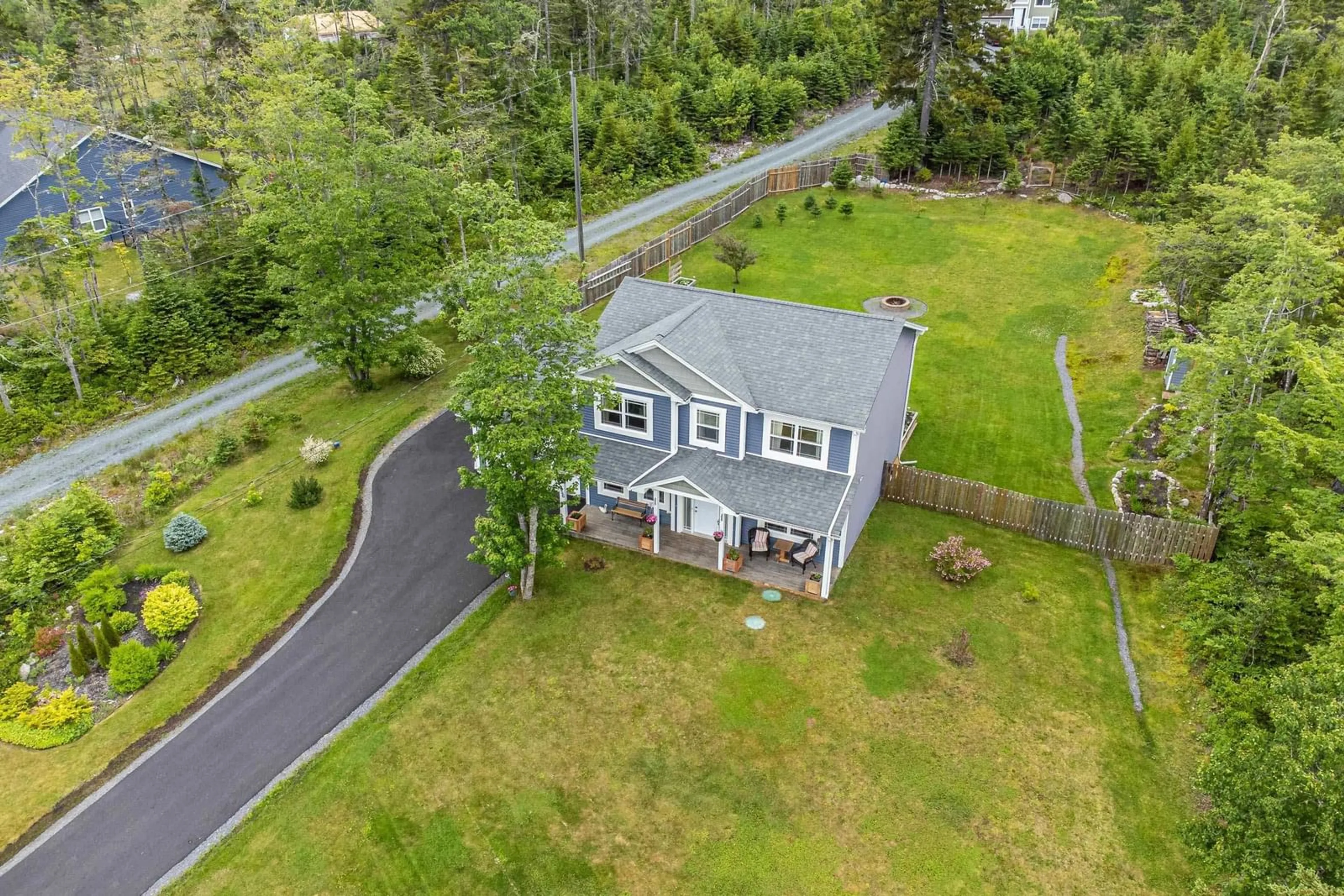A pic from outside/outdoor area/front of a property/back of a property/a pic from drone, water/lake/river/ocean view for 56 Powers Rd, Whites Lake Nova Scotia B3T 0H6