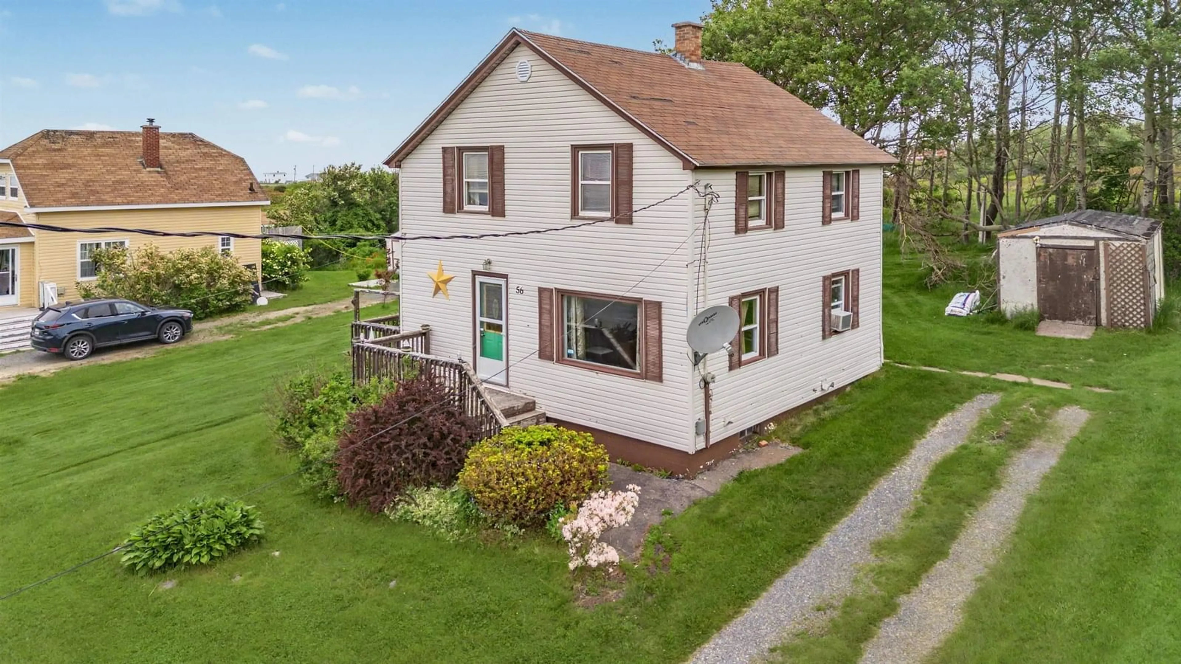 A pic from outside/outdoor area/front of a property/back of a property/a pic from drone, street for 56 Villa Nova Rd, Dominion Nova Scotia B1G 1W9