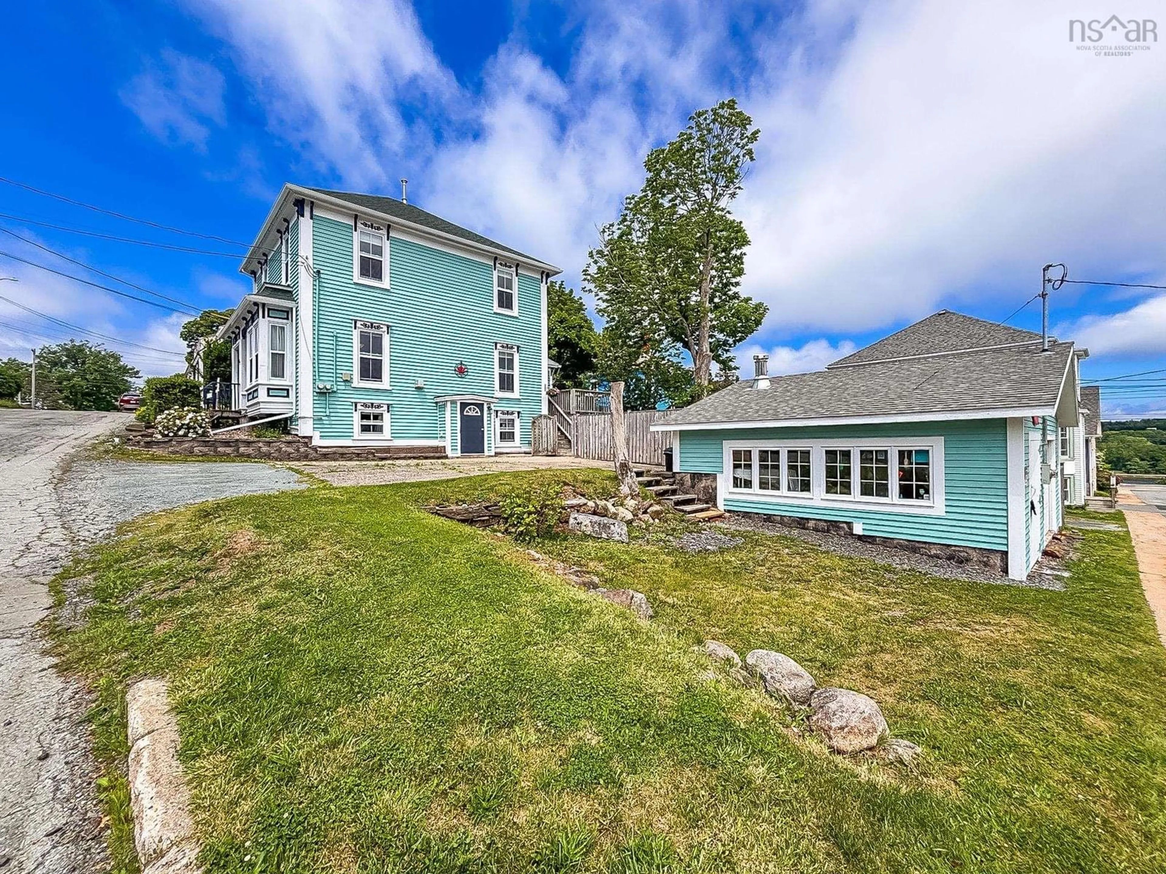 A pic from outside/outdoor area/front of a property/back of a property/a pic from drone, unknown for 61 York St, Lunenburg Nova Scotia B0J 2C0