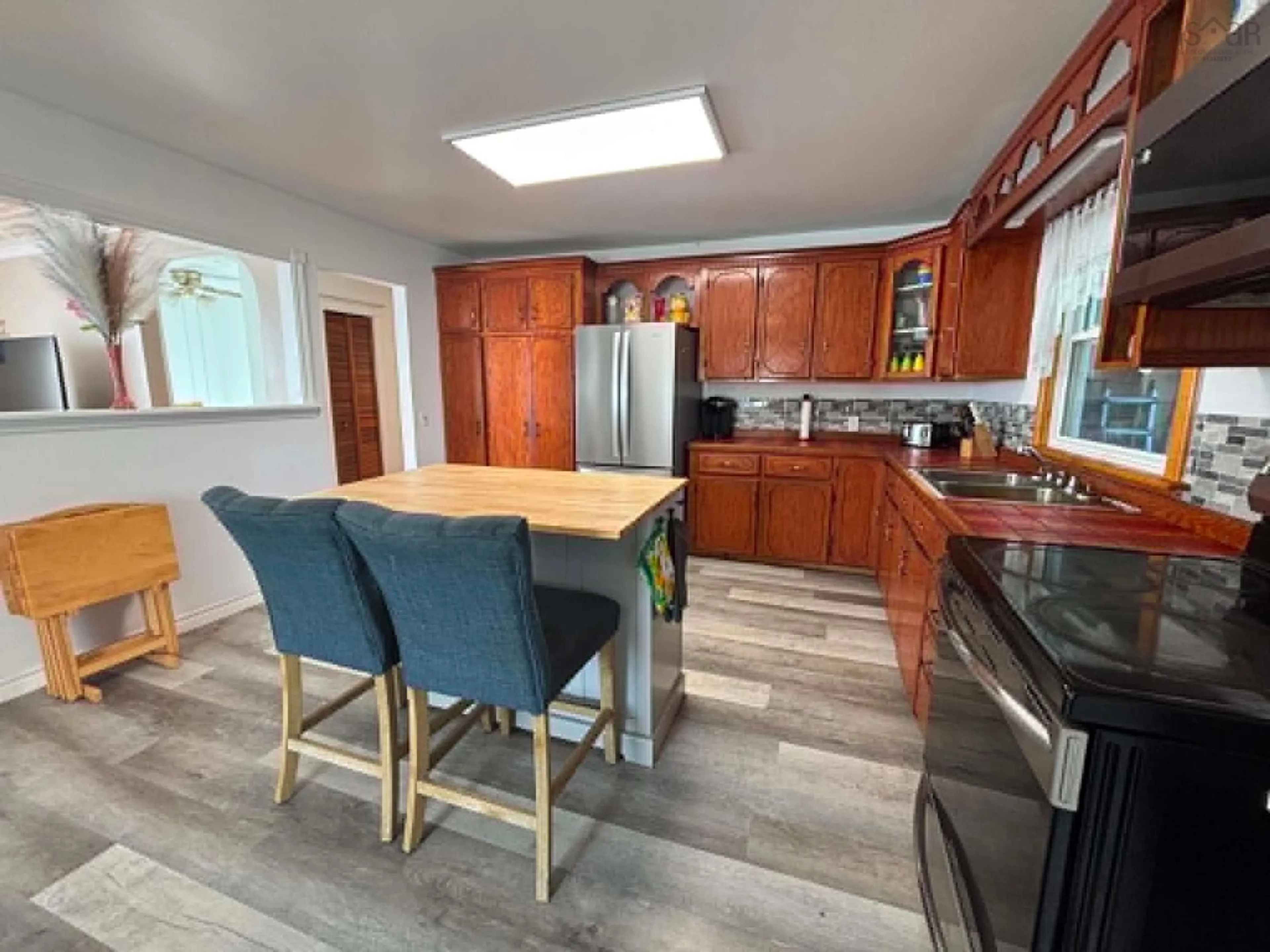Open concept kitchen, unknown for 32 Chemin Herb Leblanc Rd, Salmon River Nova Scotia B0W 2Y0