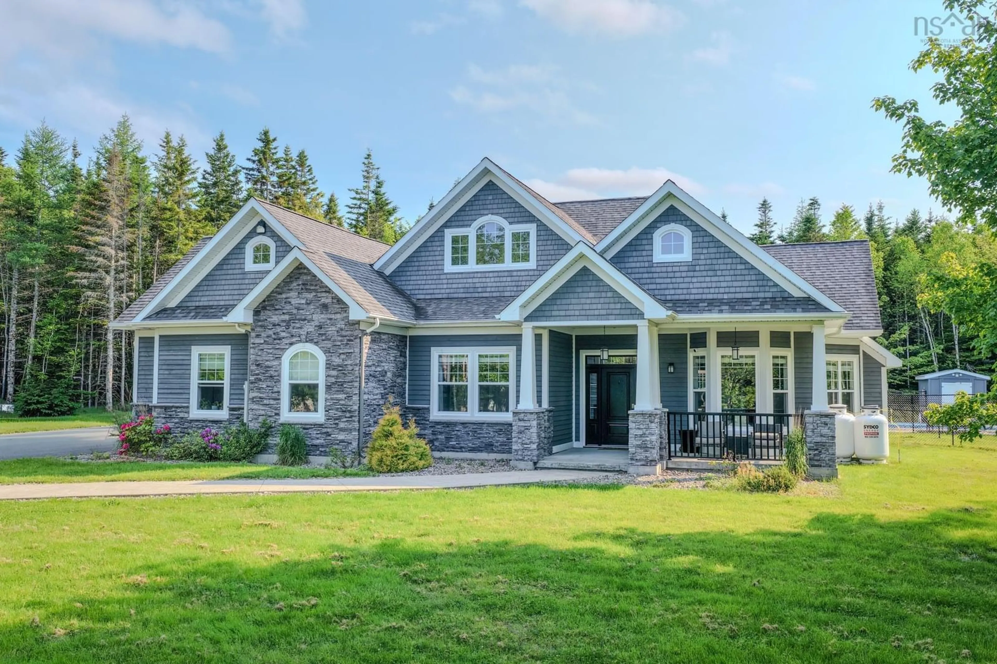 Home with brick exterior material, unknown for 136 Mountain View Dr, Sydney Forks Nova Scotia B1L 1A1
