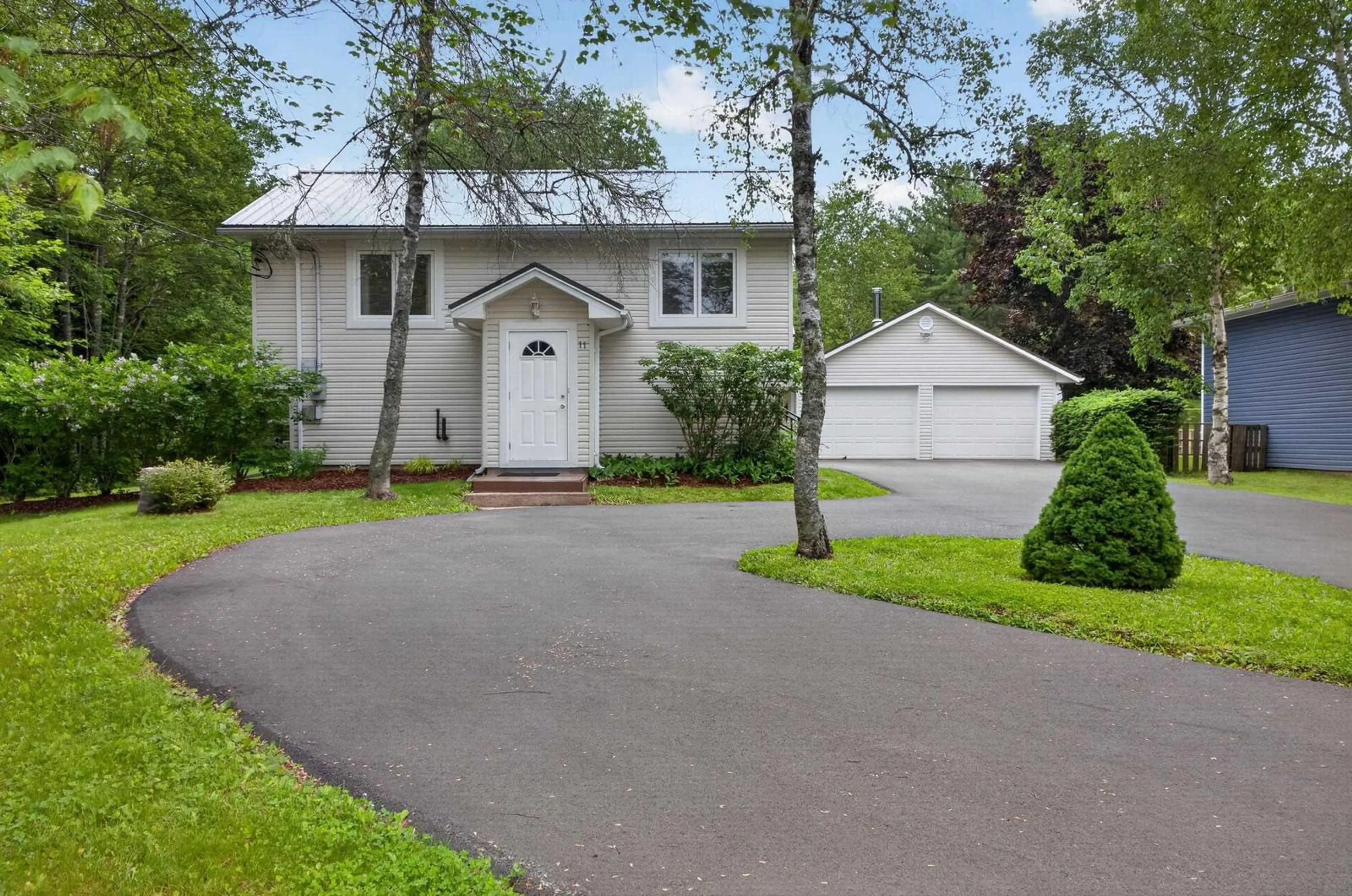 Home with vinyl exterior material, street for 11 Elder Dr, Salmon River Nova Scotia B2N 7C9