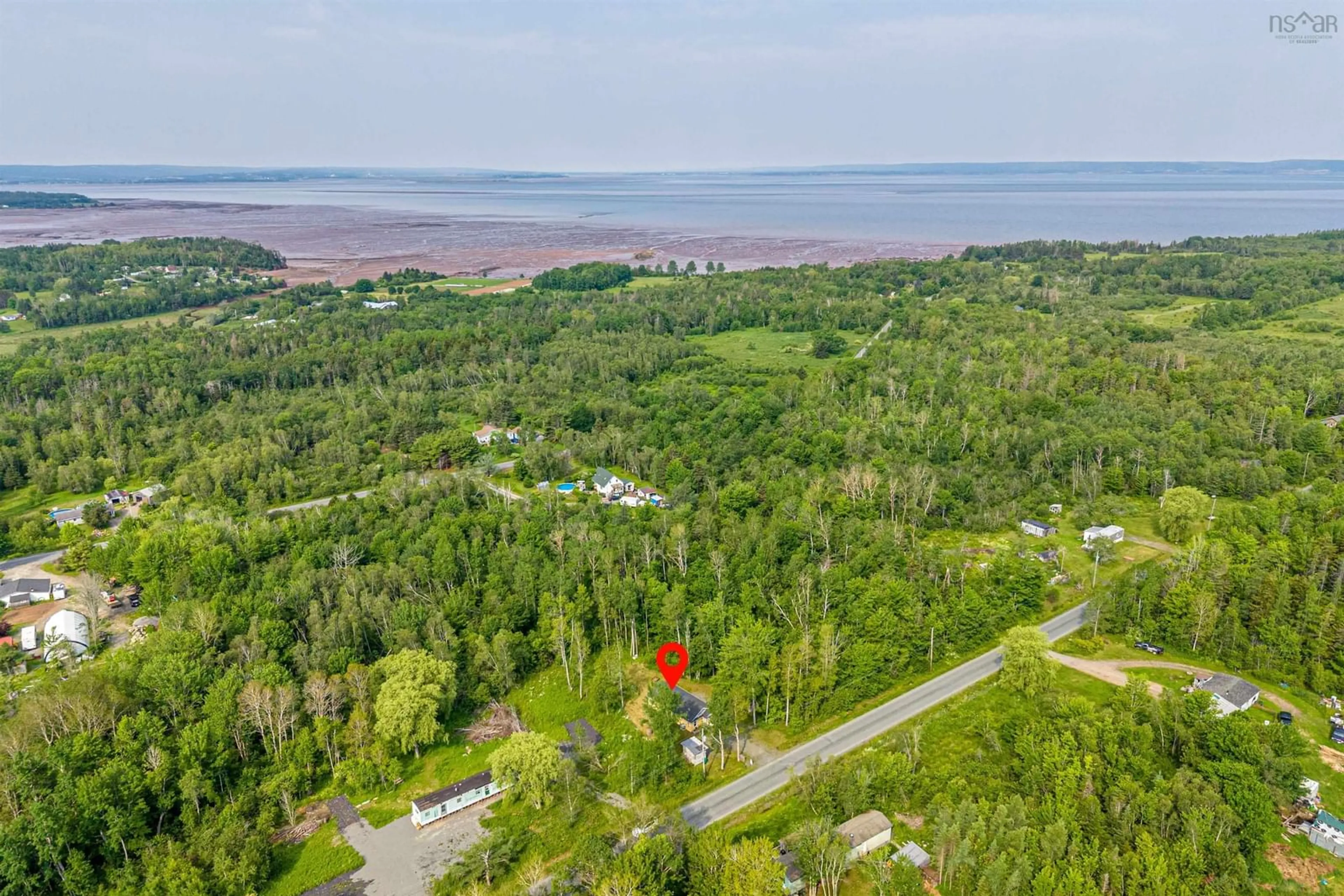 A pic from outside/outdoor area/front of a property/back of a property/a pic from drone, water/lake/river/ocean view for 69 Ocean Beach Rd, Bramber Nova Scotia B0N 2R0