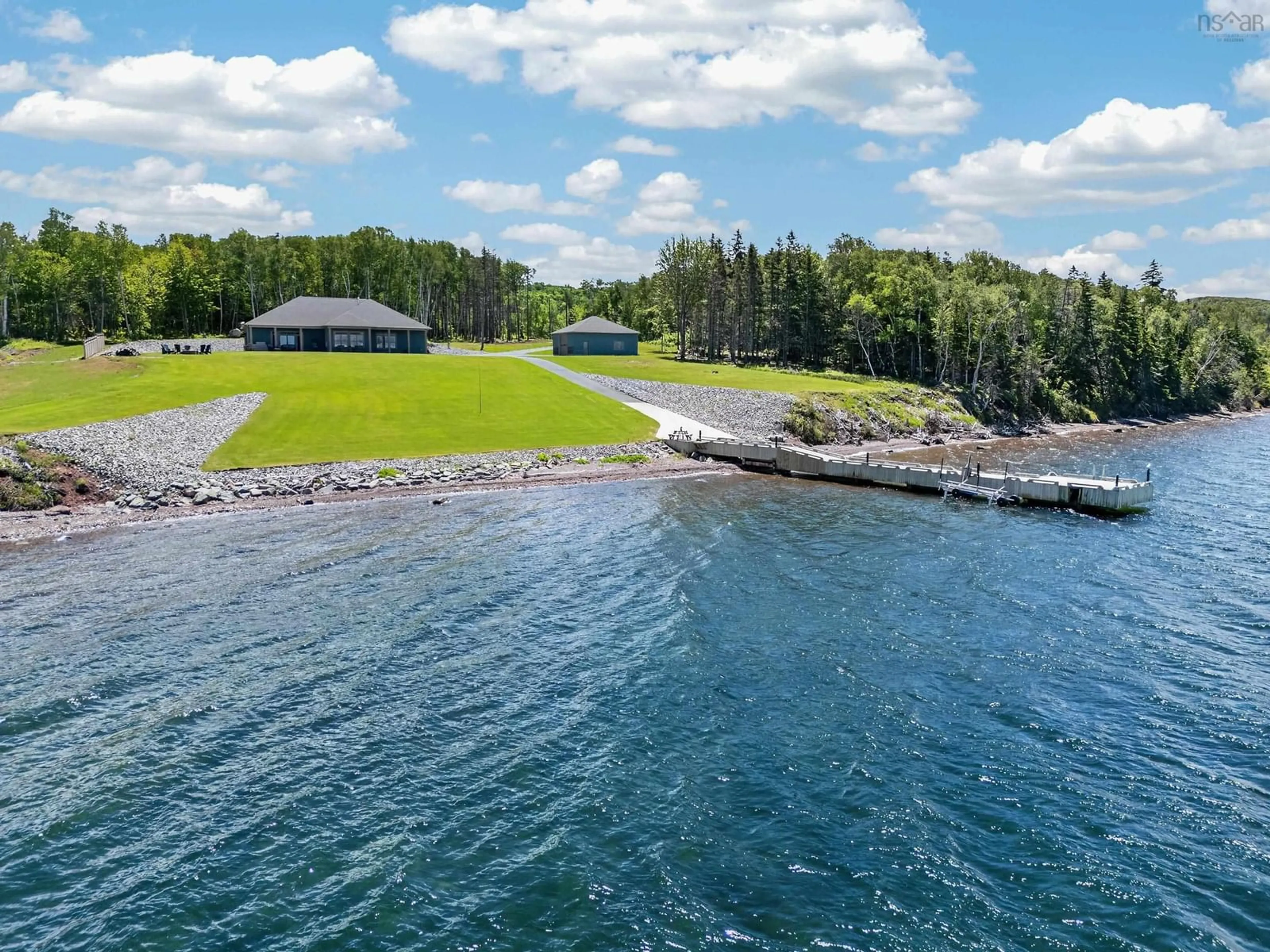 A pic from outside/outdoor area/front of a property/back of a property/a pic from drone, water/lake/river/ocean view for 5030 Grand Narrows Highway, Beaver Cove Nova Scotia B1T 0A6