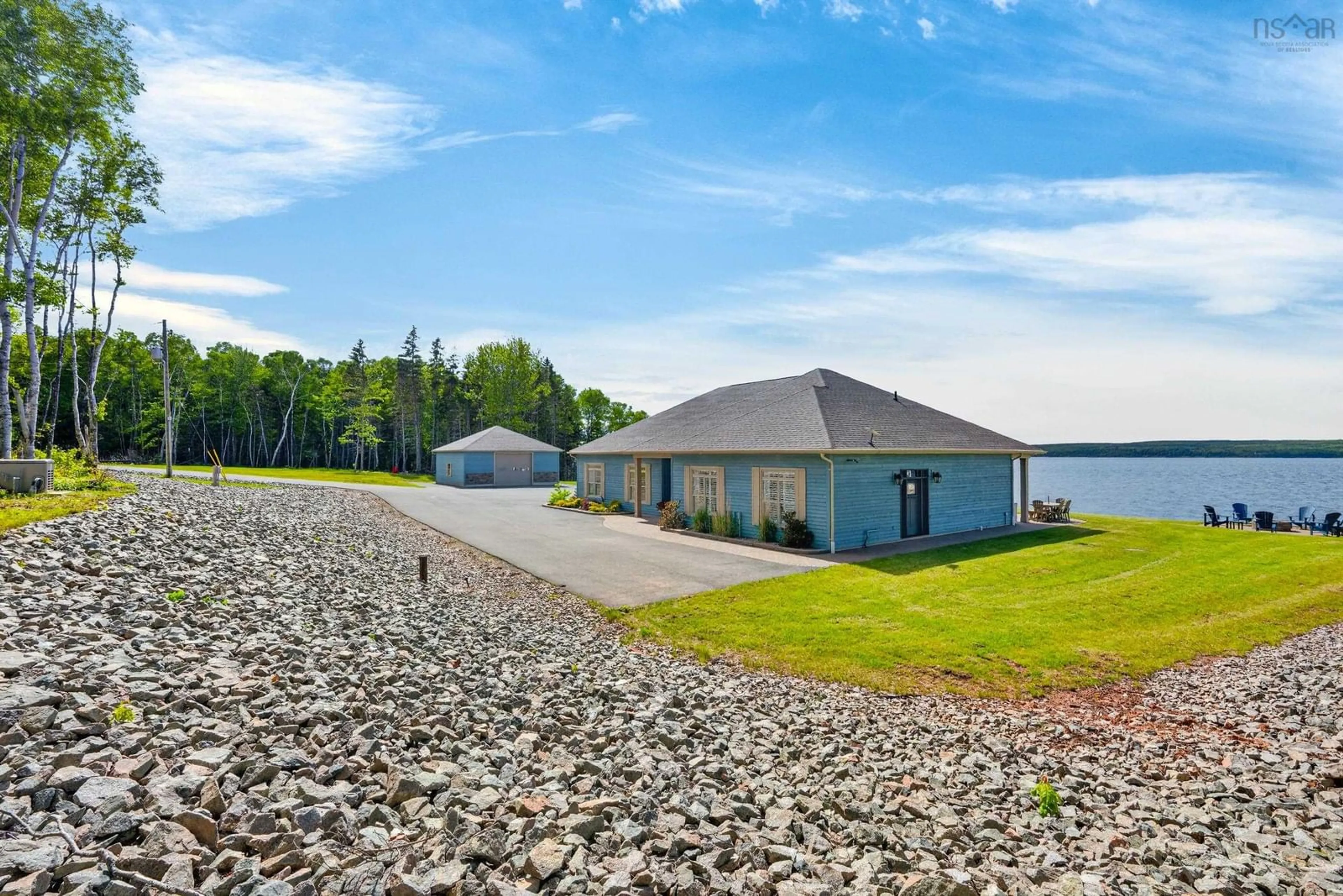 A pic from outside/outdoor area/front of a property/back of a property/a pic from drone, water/lake/river/ocean view for 5030 Grand Narrows Highway, Beaver Cove Nova Scotia B1T 0A6