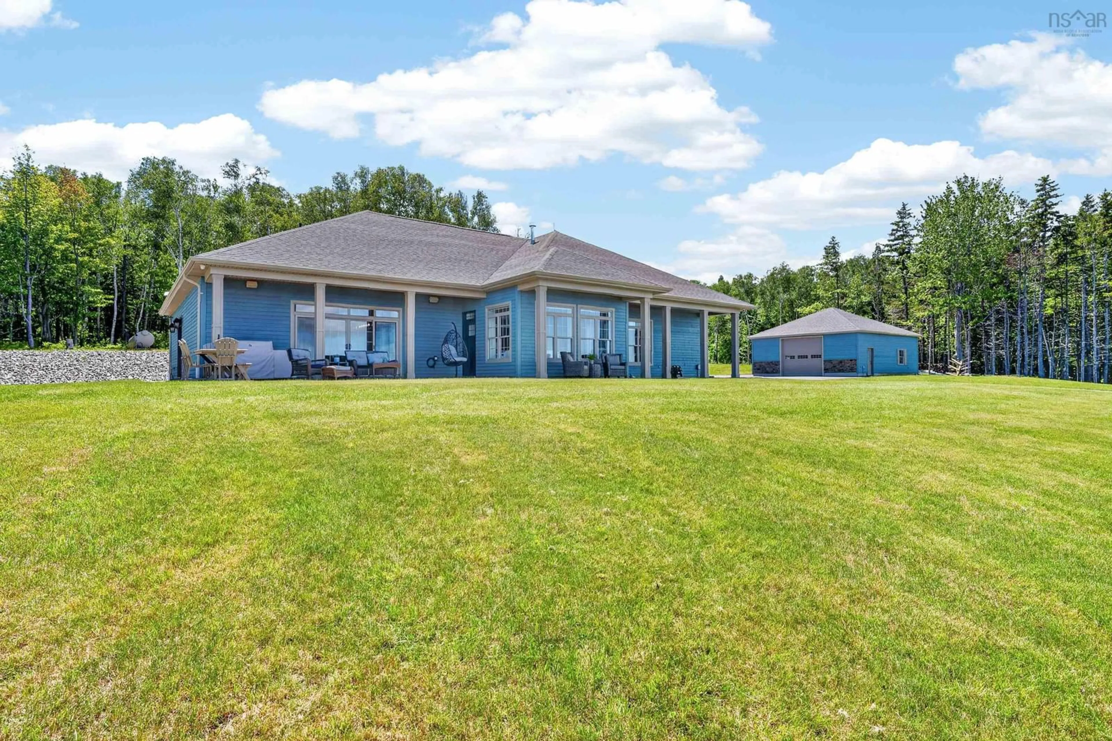 A pic from outside/outdoor area/front of a property/back of a property/a pic from drone, water/lake/river/ocean view for 5030 Grand Narrows Highway, Beaver Cove Nova Scotia B1T 0A6