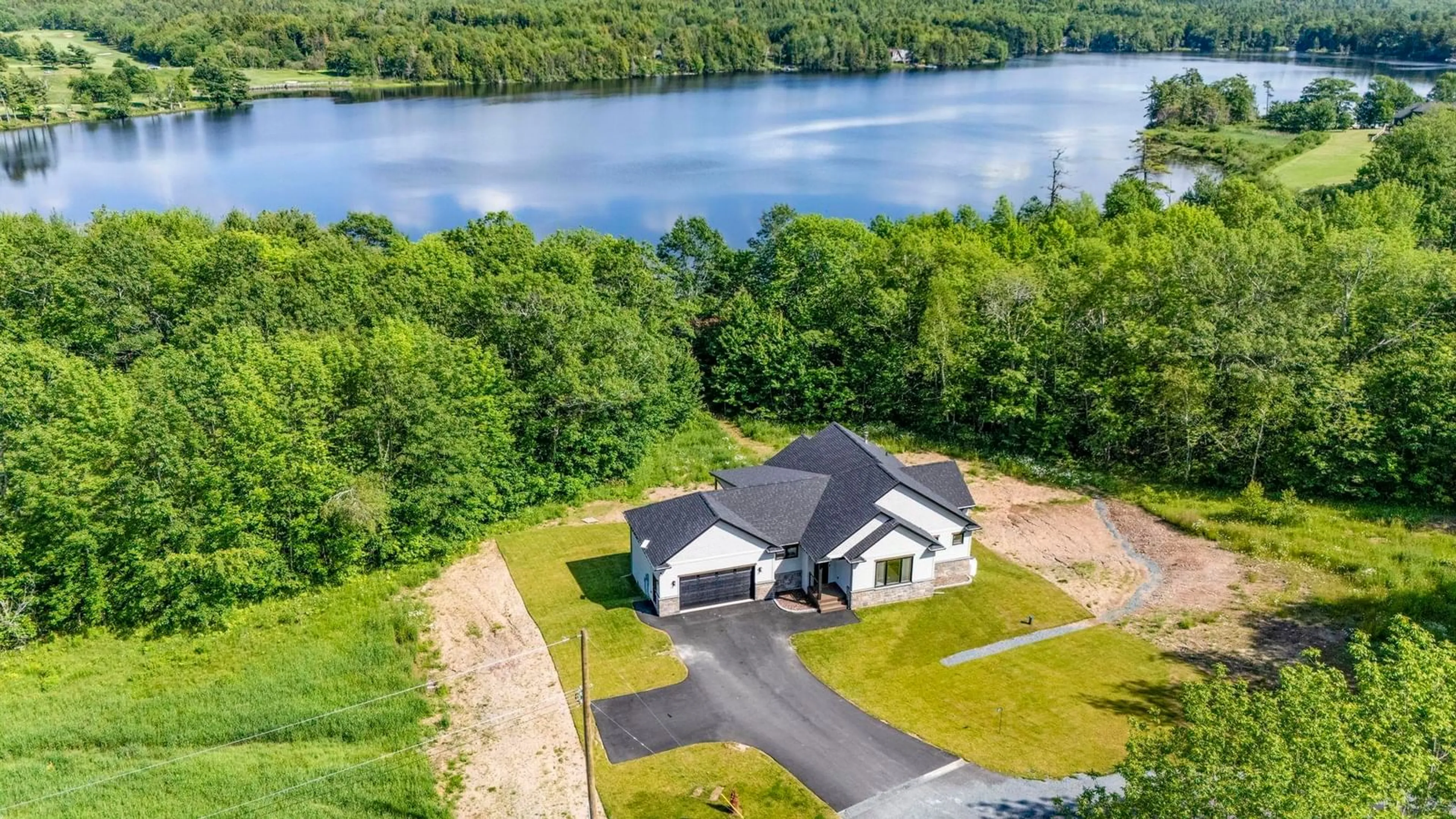 A pic from outside/outdoor area/front of a property/back of a property/a pic from drone, water/lake/river/ocean view for 27 Prettybird Lane, Oakfield Nova Scotia B2T 1B3