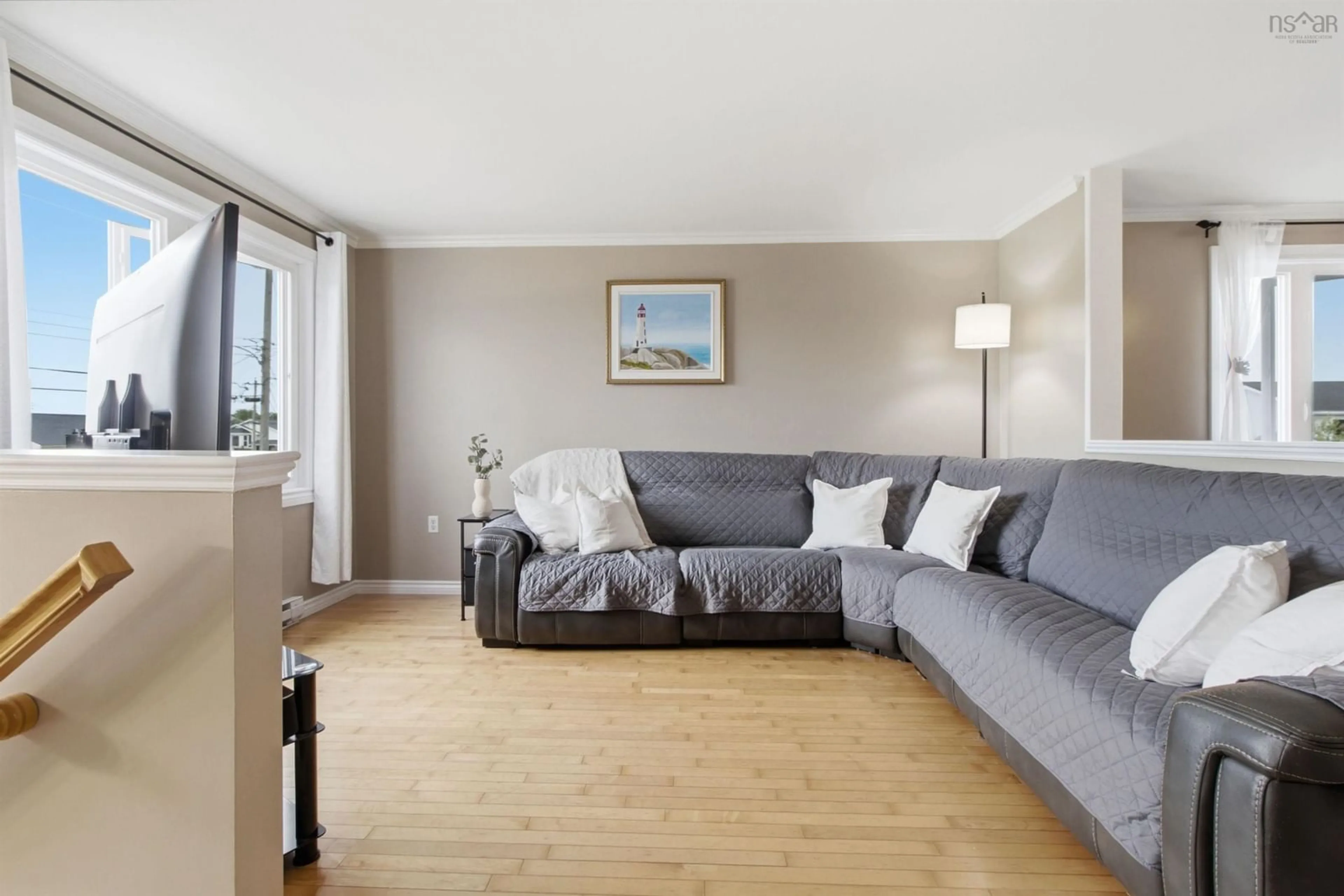 Living room with furniture, wood/laminate floor for 171 Serop Cres, Eastern Passage Nova Scotia B3G 1P6