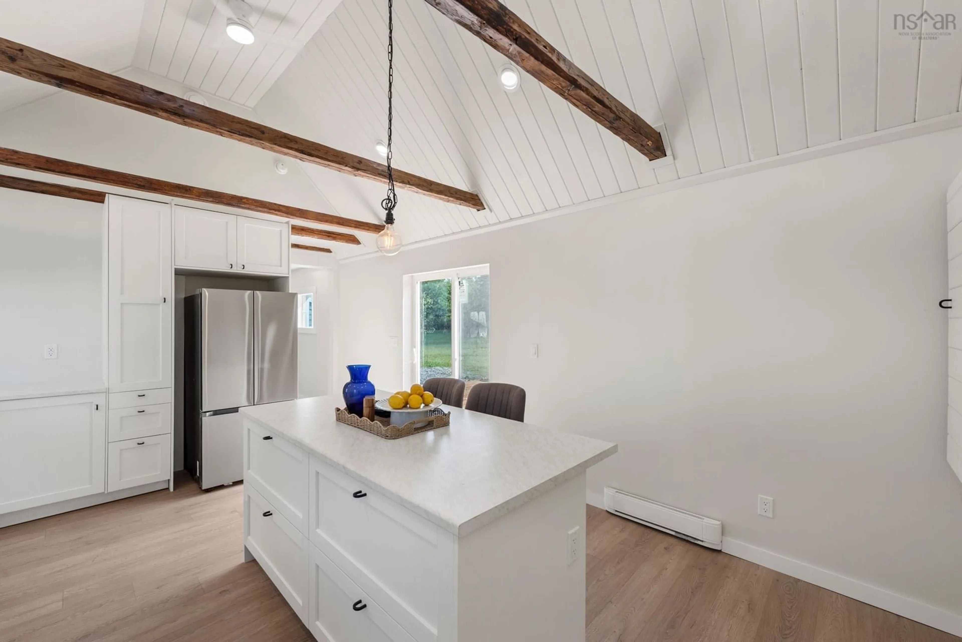 Open concept kitchen, wood/laminate floor for 4476 Highway 3, Central Argyle Nova Scotia B0W 1W0
