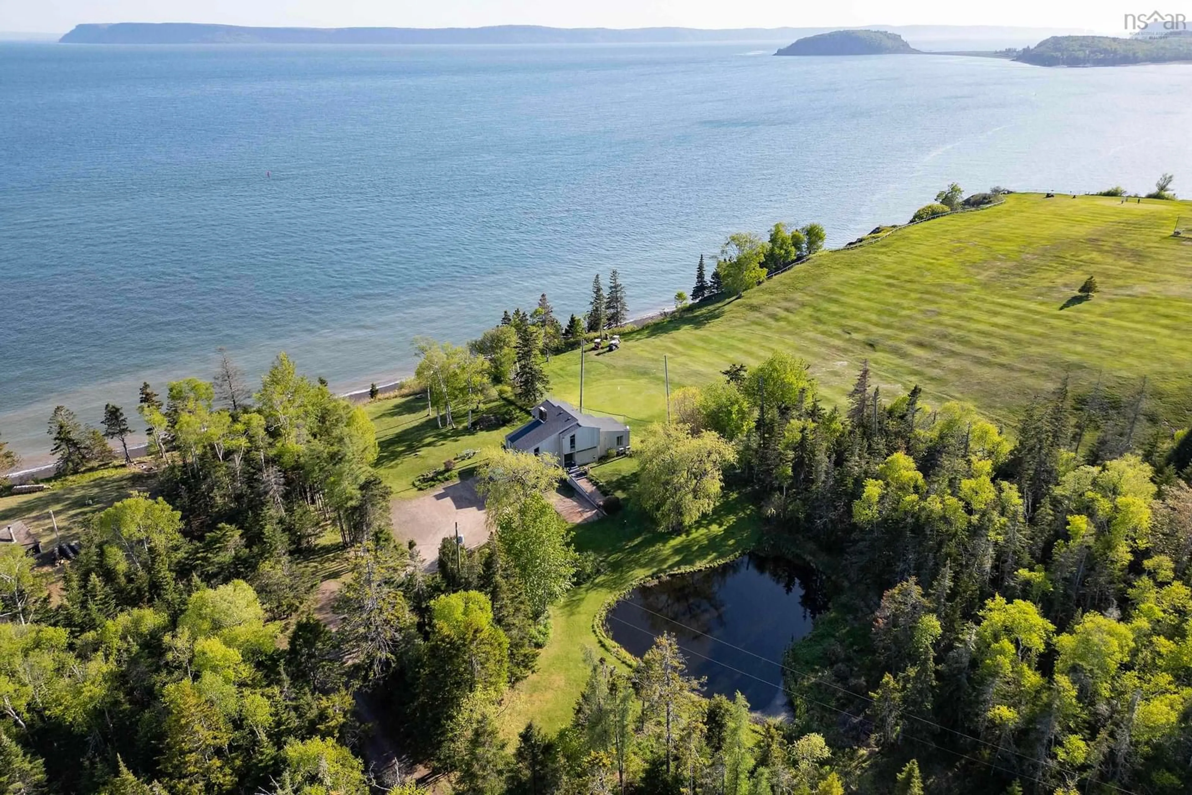 A pic from outside/outdoor area/front of a property/back of a property/a pic from drone, water/lake/river/ocean view for 3 Shore Lane, Greenhill Nova Scotia B0M 1S0