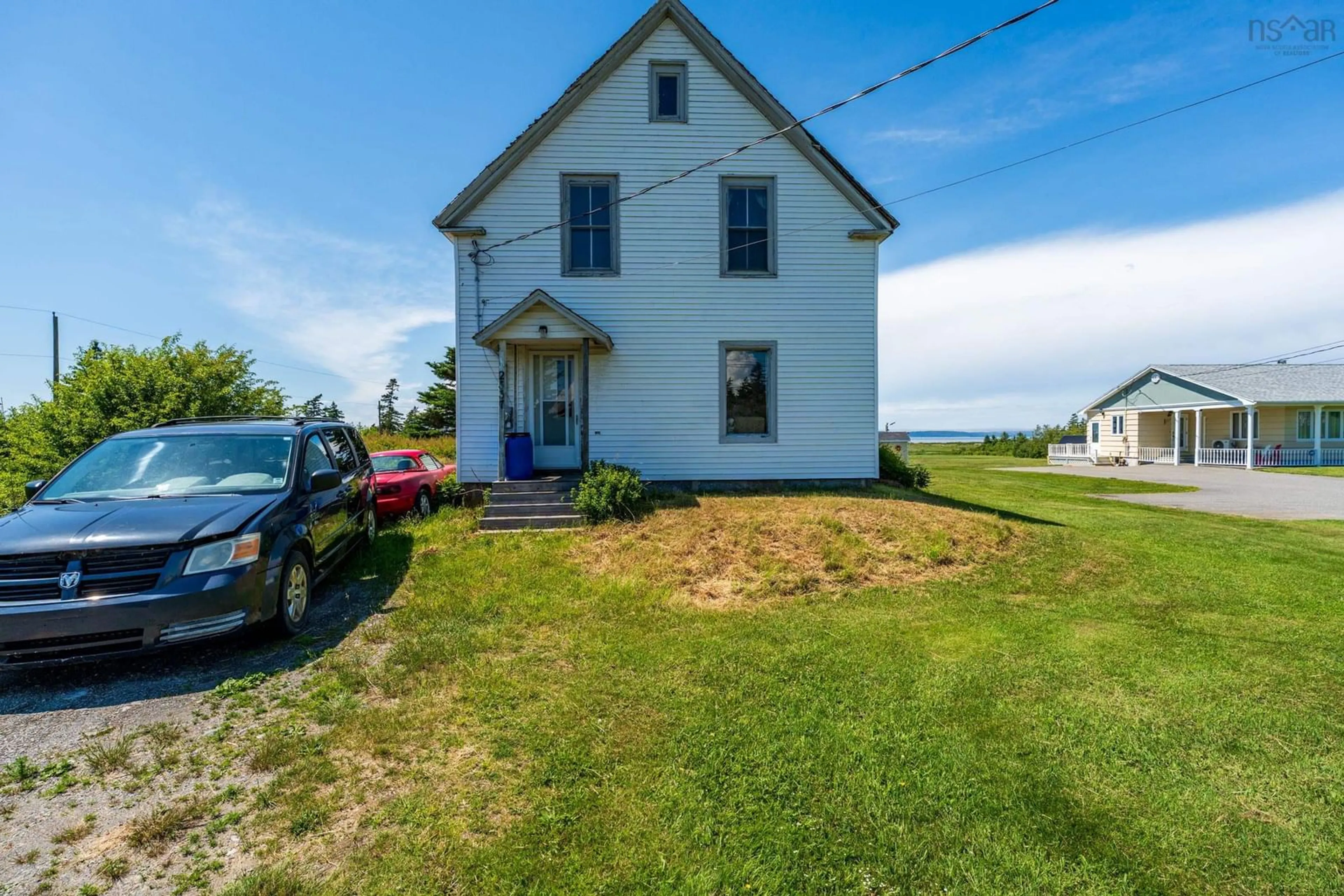 A pic from outside/outdoor area/front of a property/back of a property/a pic from drone, building for 2337 Highway 1, Grosses Coques Nova Scotia B0W 1M0
