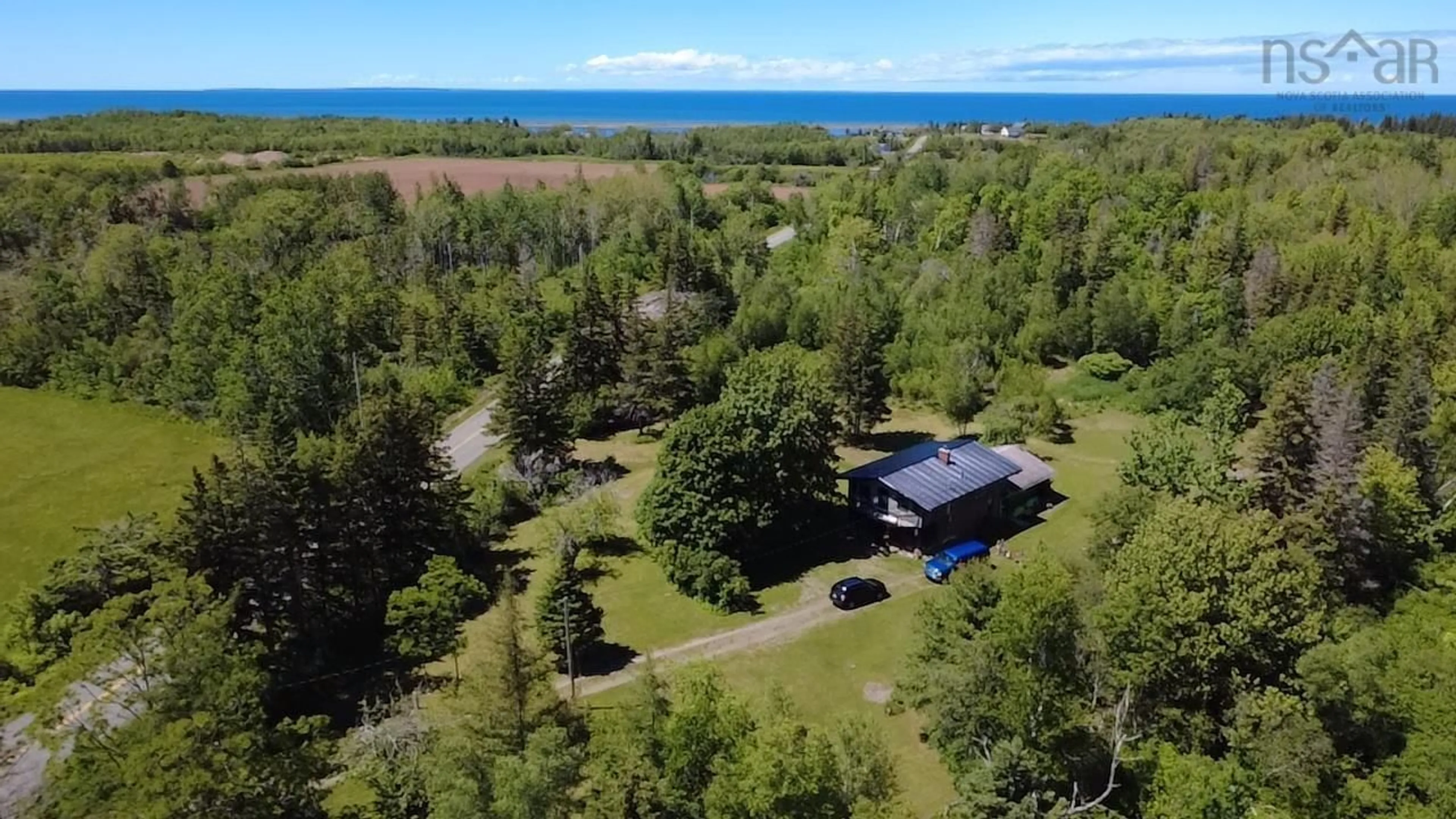 A pic from outside/outdoor area/front of a property/back of a property/a pic from drone, water/lake/river/ocean view for 2421 Big Island Rd, Lower Barneys River Nova Scotia B0K 1G0