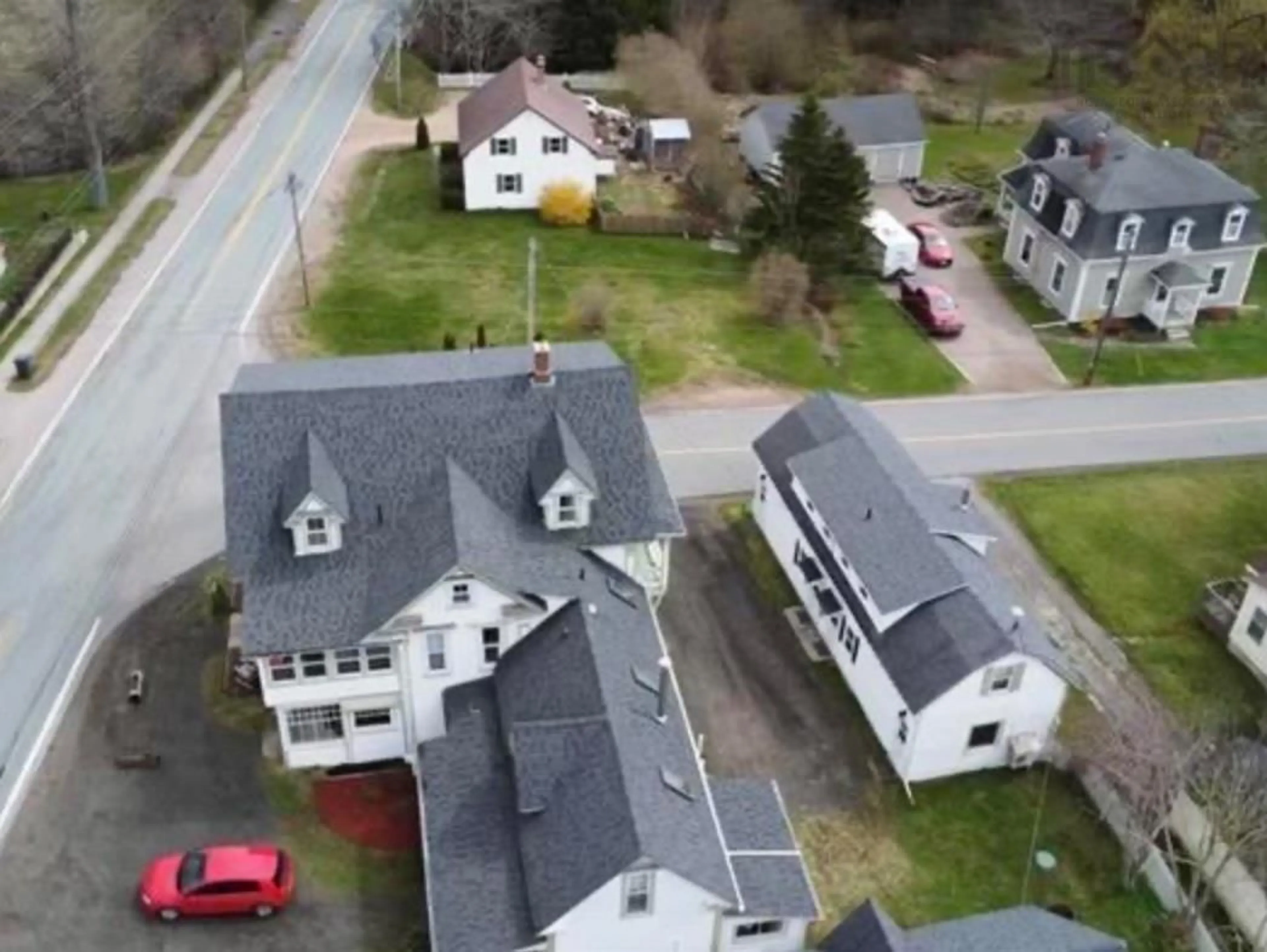 A pic from outside/outdoor area/front of a property/back of a property/a pic from drone, street for 10352 1 Hwy, Paradise Nova Scotia B0P 1R0