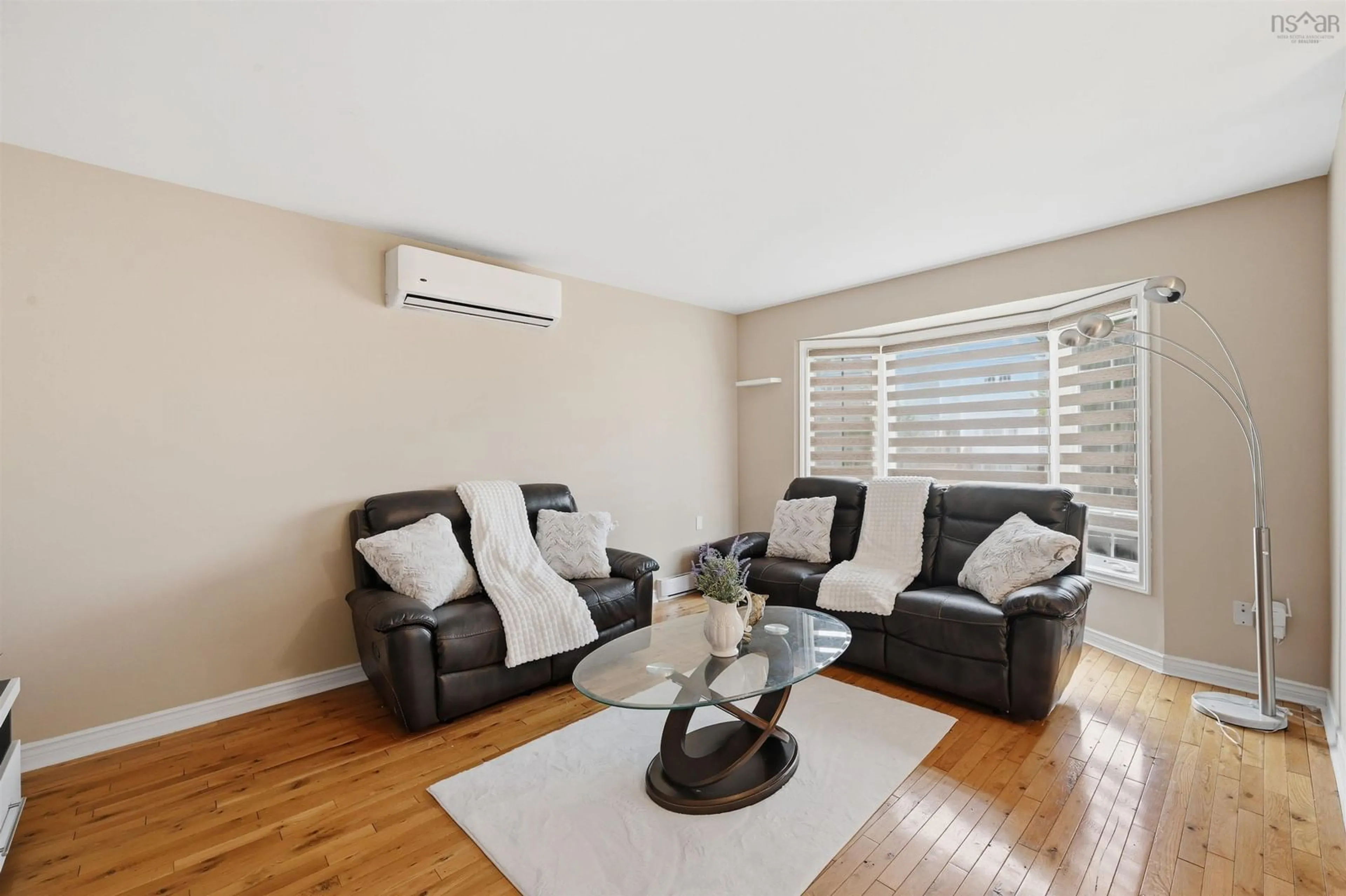 Living room with furniture, wood/laminate floor for 174 Silistria Dr, Forest Hills Nova Scotia B2W 6B1