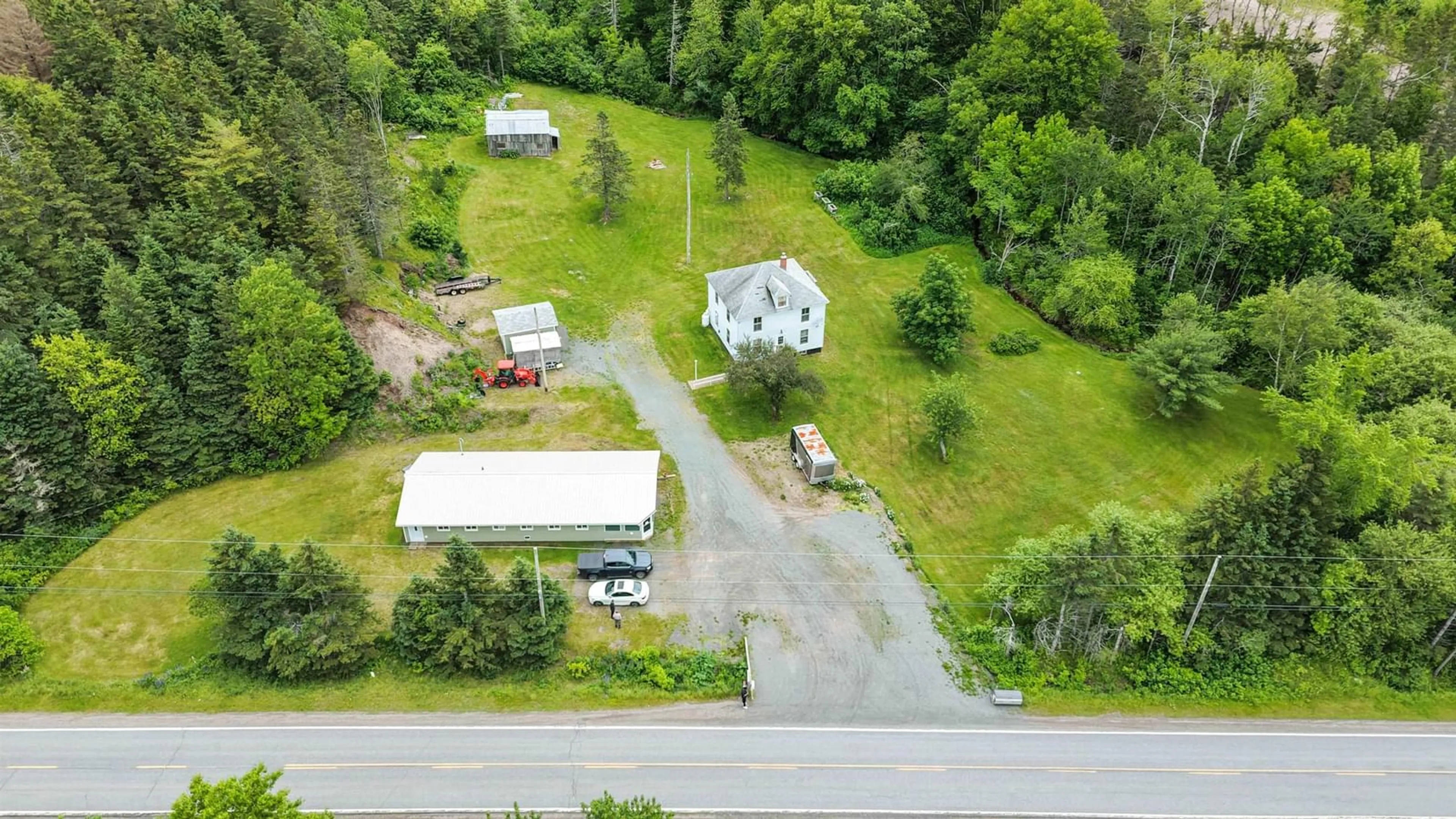 A pic from outside/outdoor area/front of a property/back of a property/a pic from drone, unknown for 1980 Highway 7, North Lochaber Nova Scotia B2G 2L3
