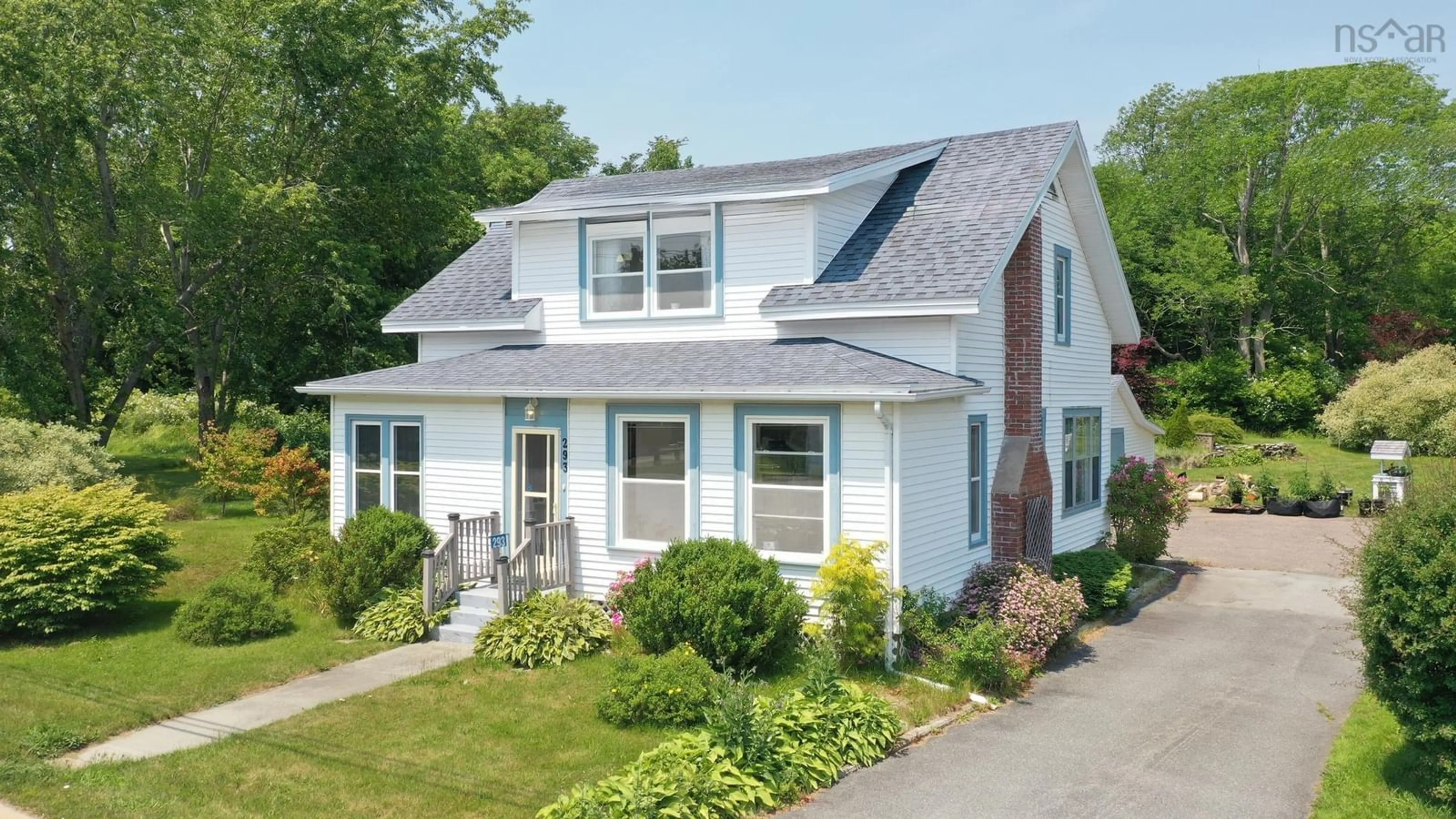 Home with vinyl exterior material, street for 293 Highway 8, Milton, Milton Nova Scotia B0T 1P0