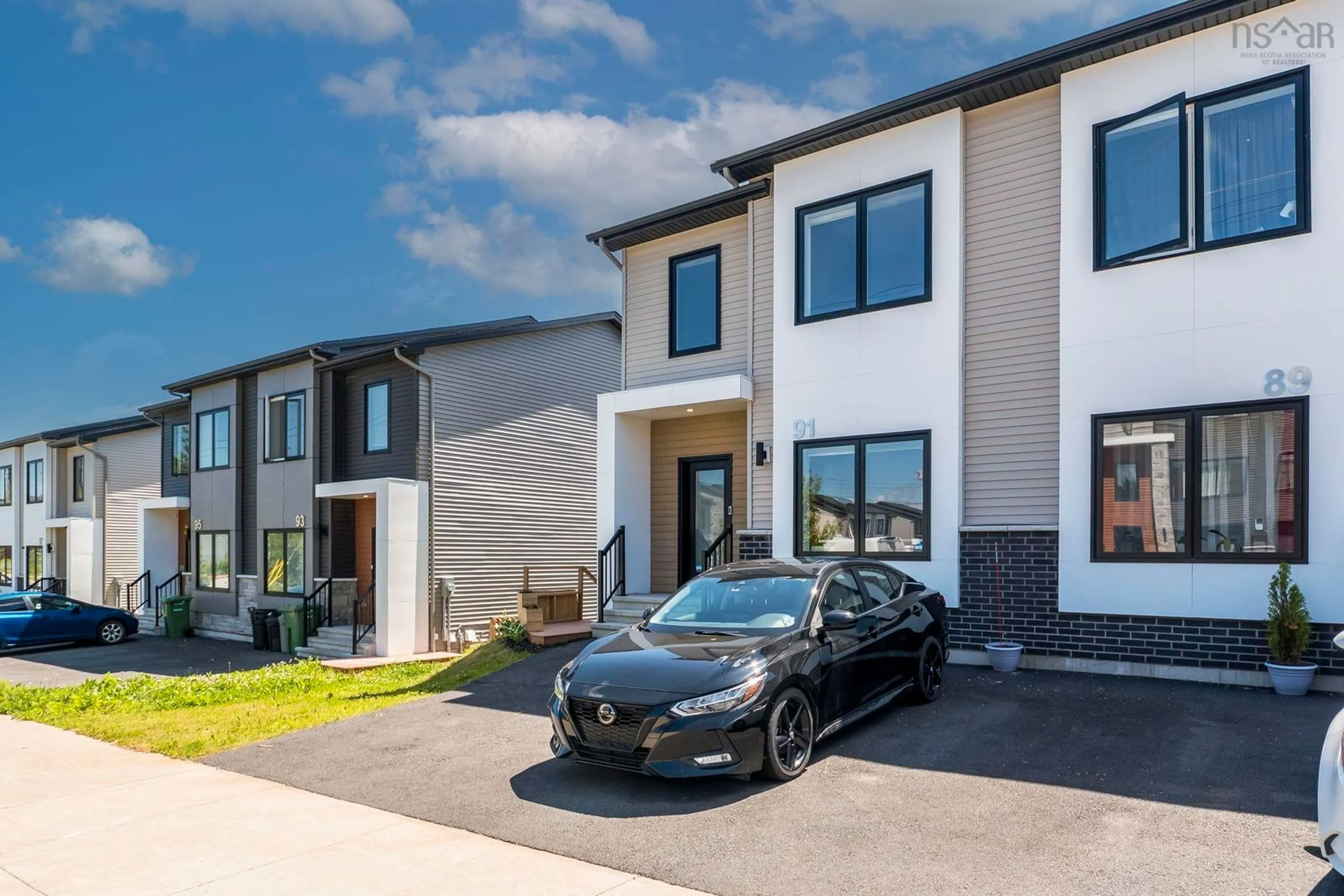 Home with vinyl exterior material, street for 91 Honeygold Dr, Halifax Nova Scotia B3R 0G3