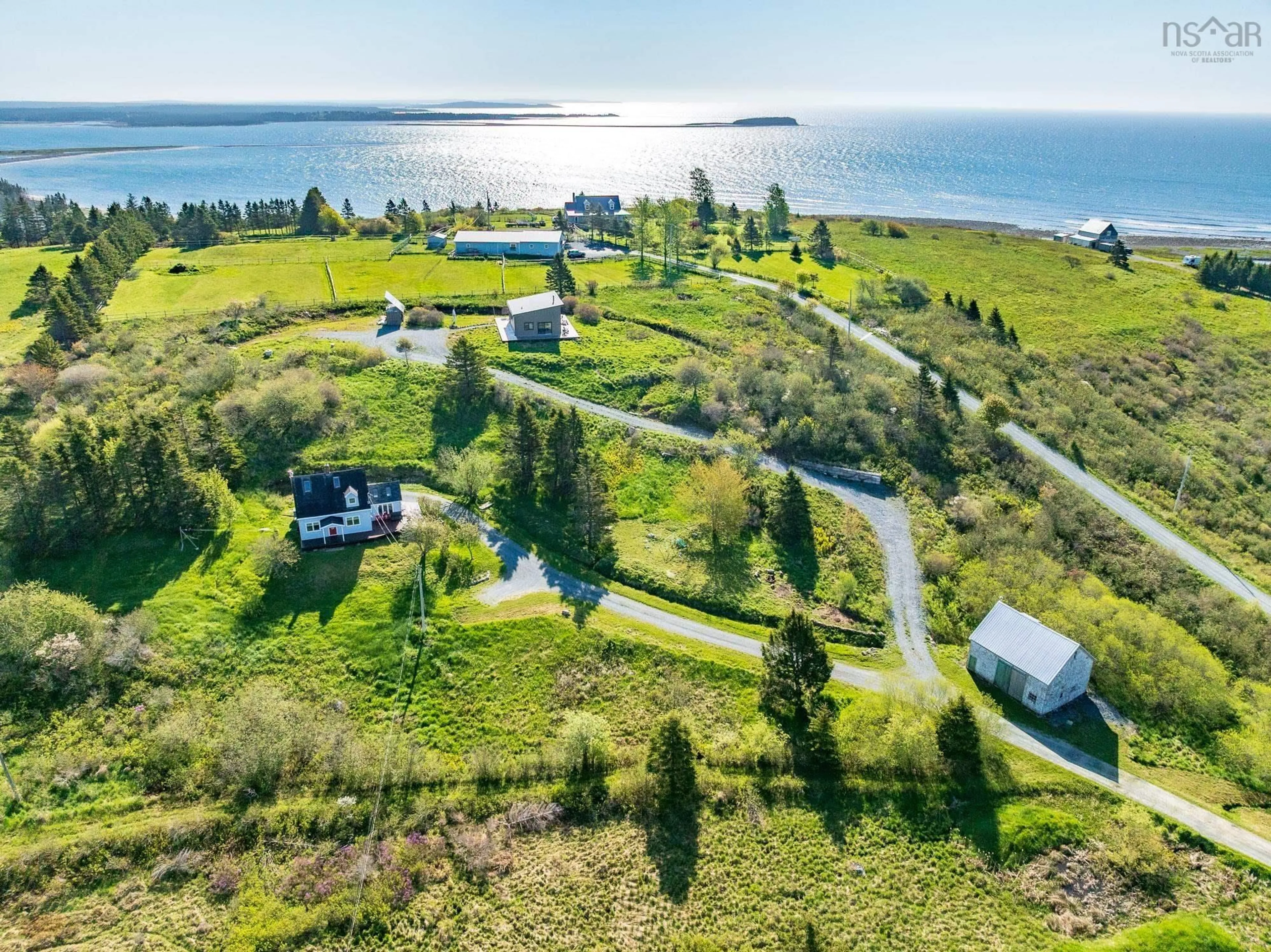 A pic from outside/outdoor area/front of a property/back of a property/a pic from drone, water/lake/river/ocean view for 6176 Highway 207, Seaforth Nova Scotia B0J 2L0
